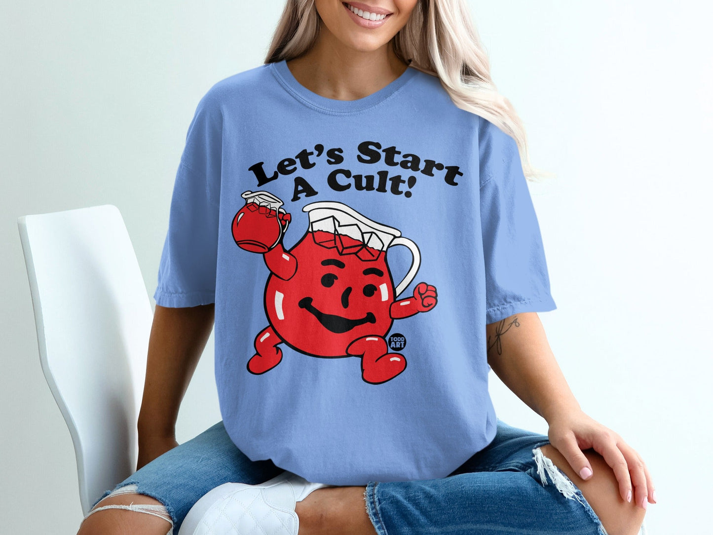 Blue t-shirt featuring Kool-Aid Man with text "Let's Start a Cult!"