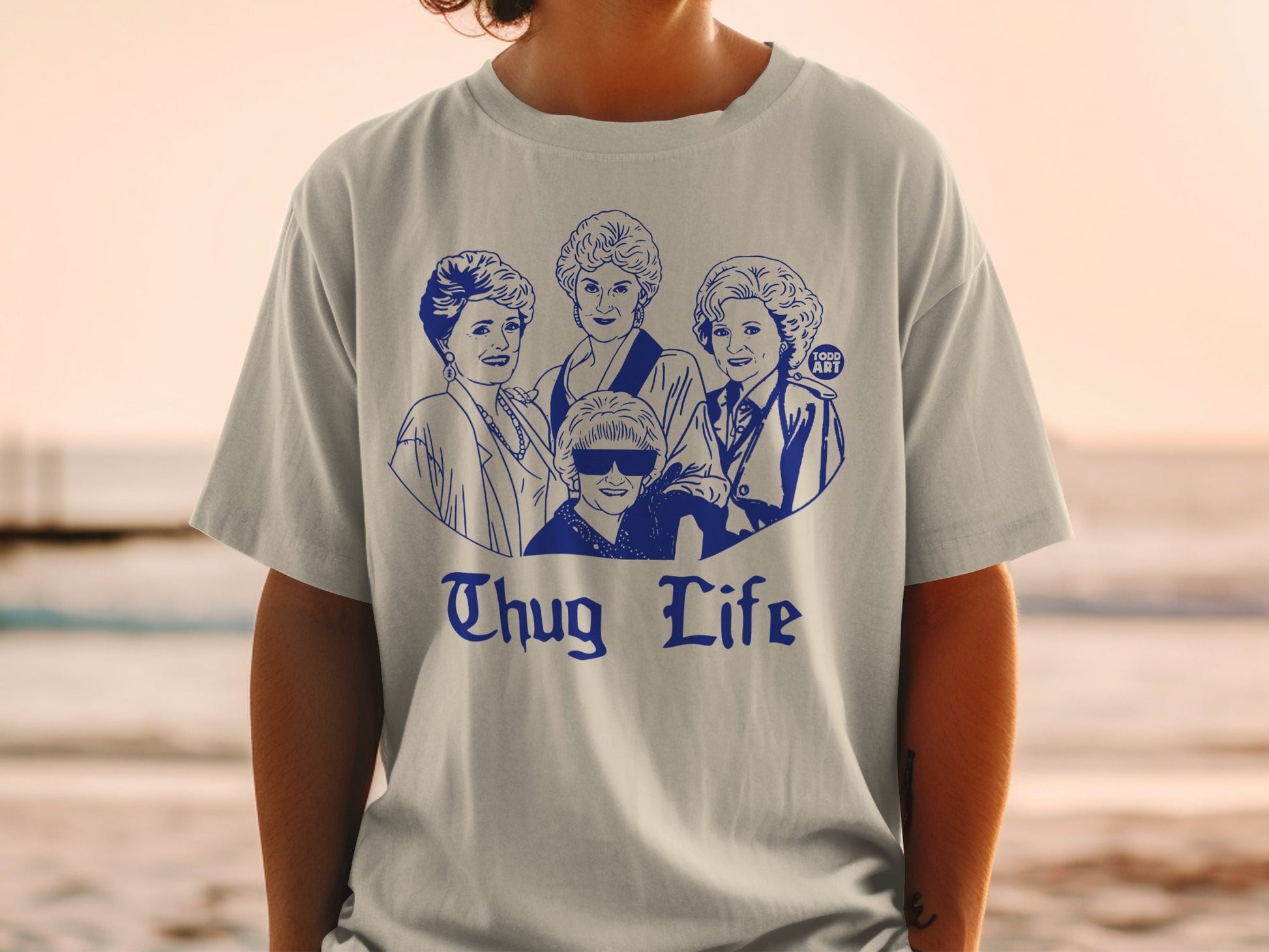 Thug Life t-shirt featuring a blue graphic of The Golden Girls characters.