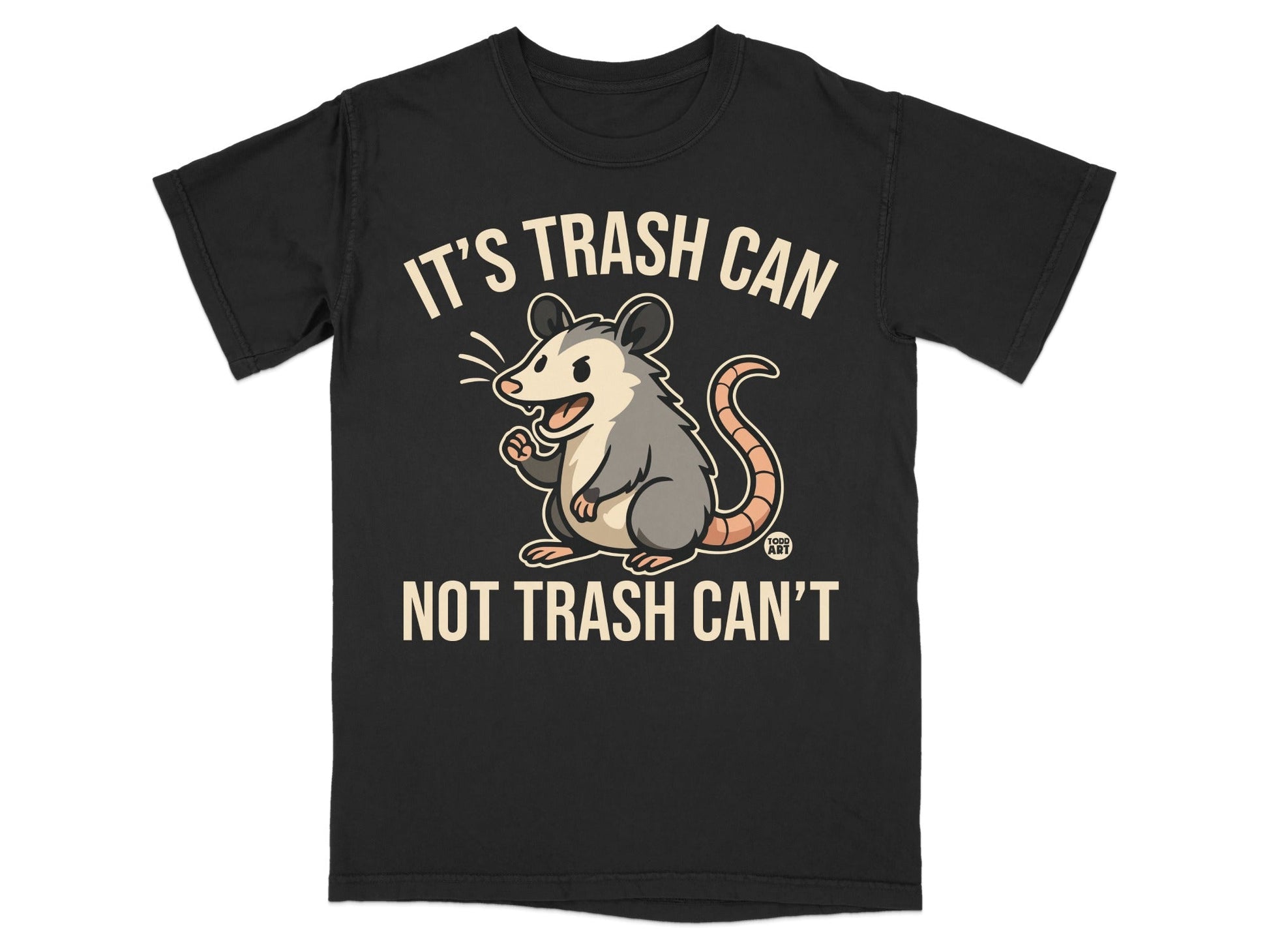 Black t-shirt with a cartoon possum and text "IT'S TRASH CAN NOT TRASH CAN'T".