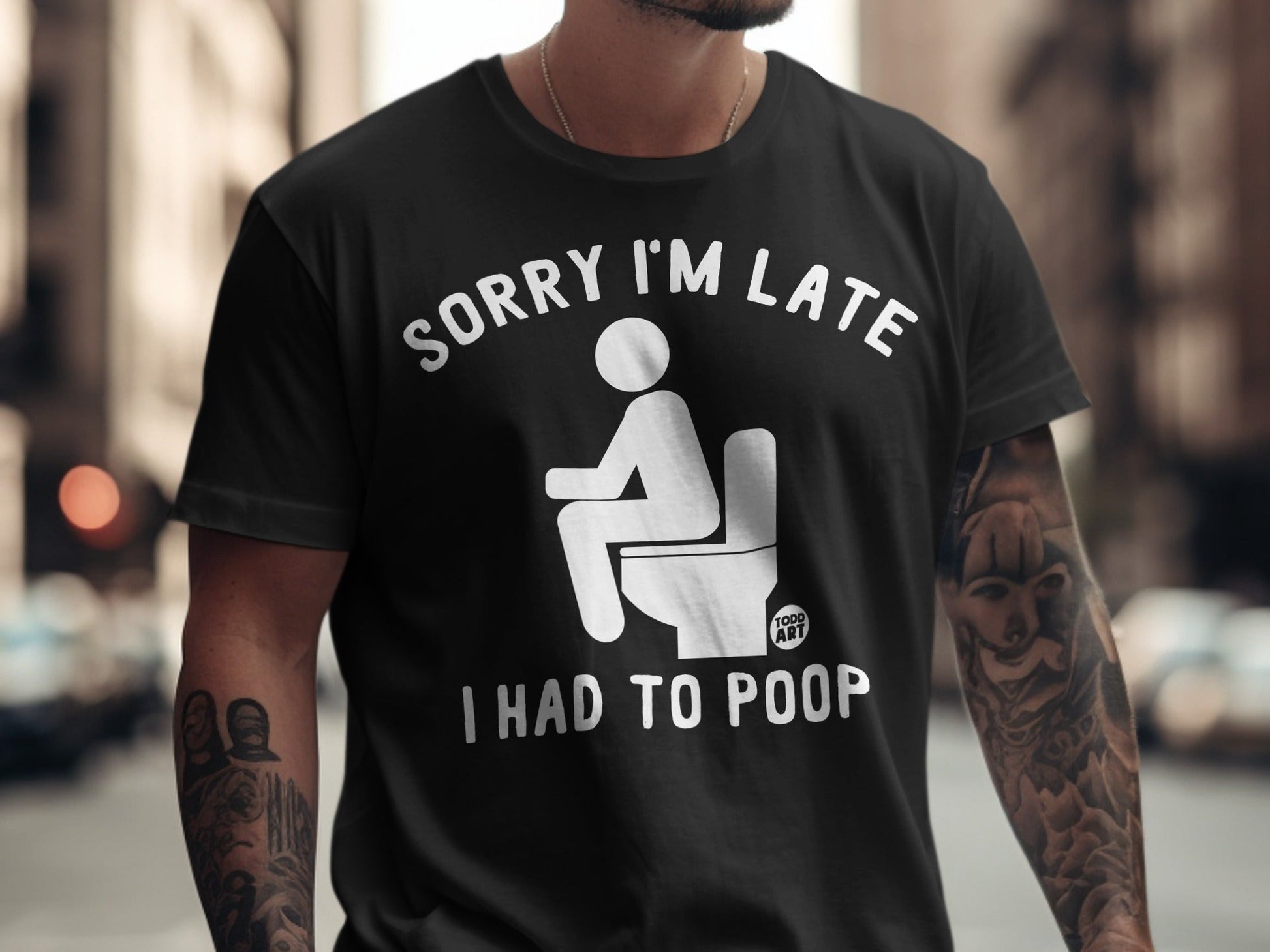 Black t-shirt with white text and graphic: "Sorry I'm Late, I Had to Poop".
