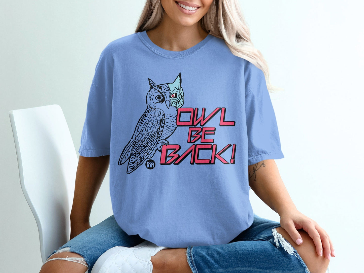 Light blue t-shirt with owl graphic and "OWL BE BACK!" text.