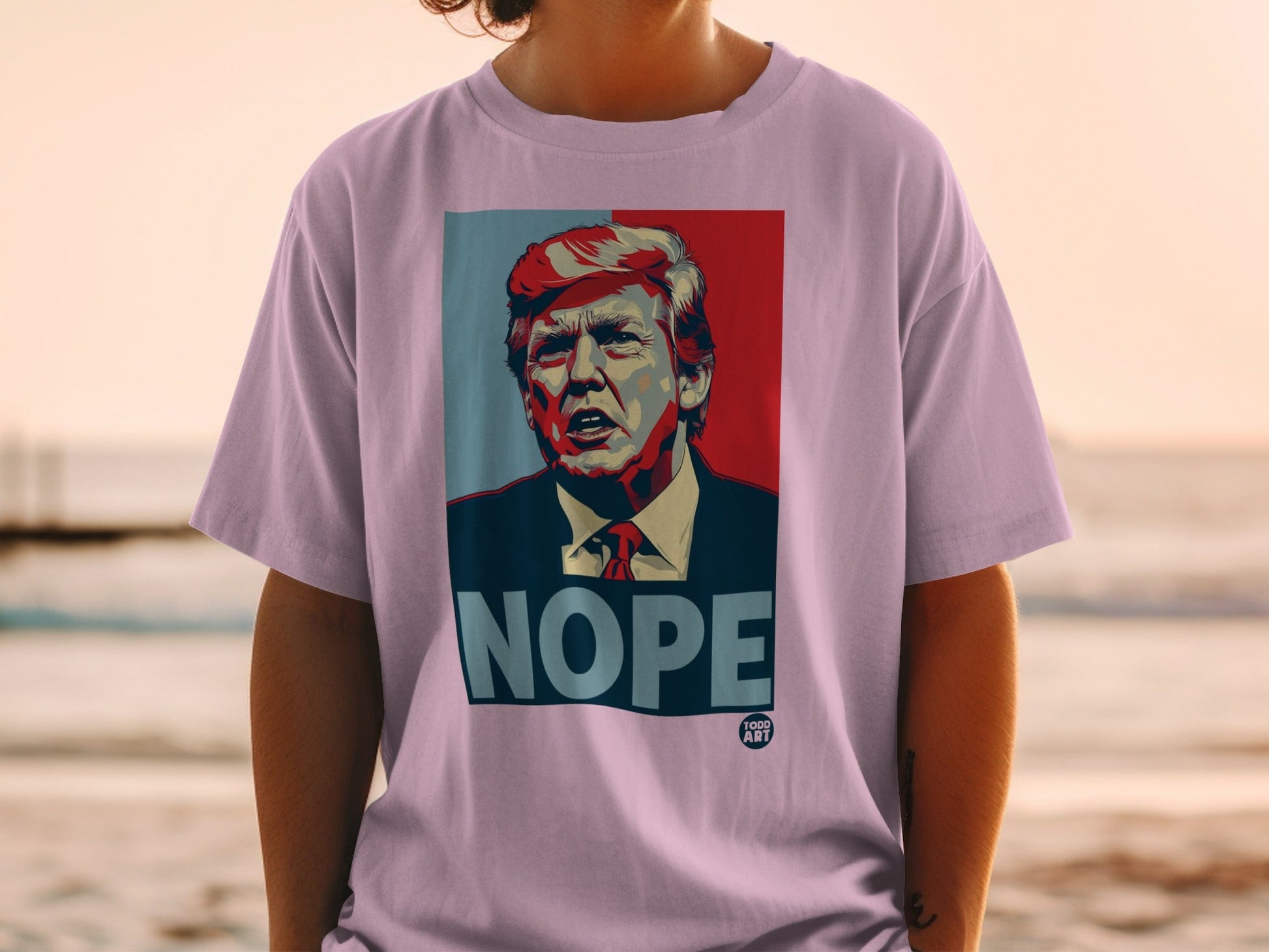 Donald Trump "NOPE" graphic t-shirt with red and blue background.