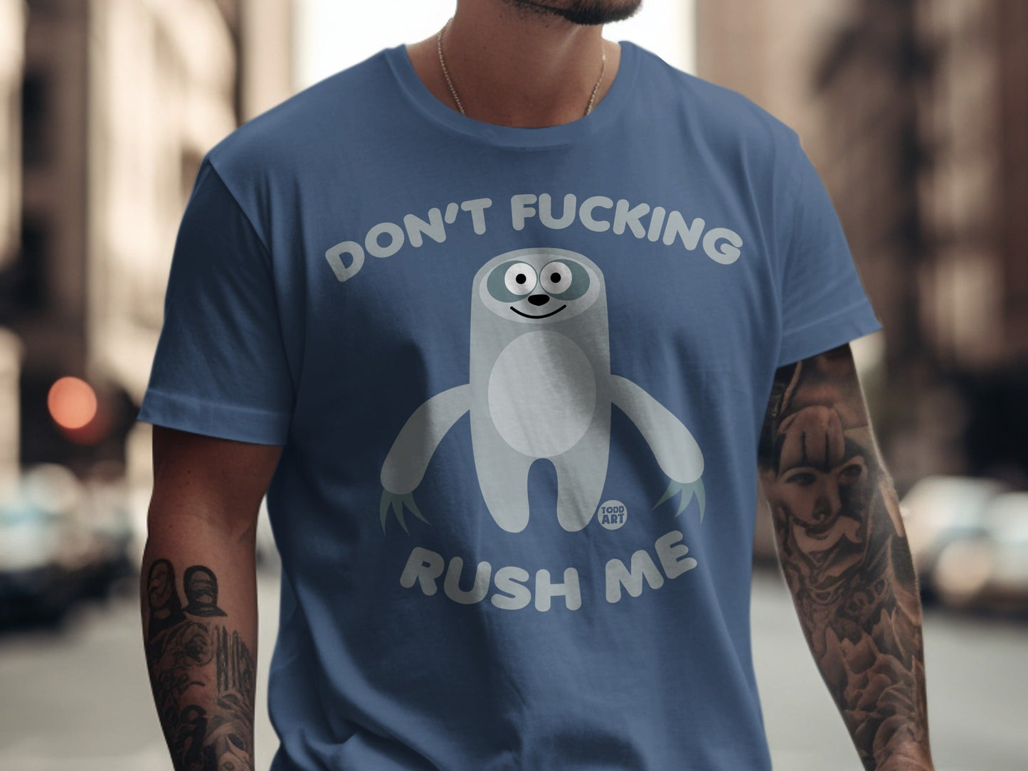 T-shirt with a sloth graphic and text "DON'T FUCKING RUSH ME".