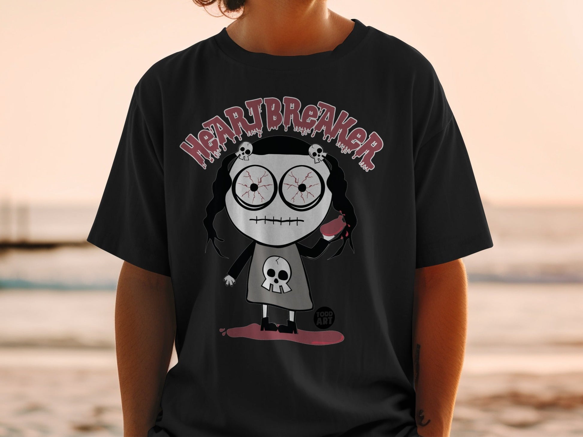 Heartbreaker Skull Art Graphic Tee for Casual Wear