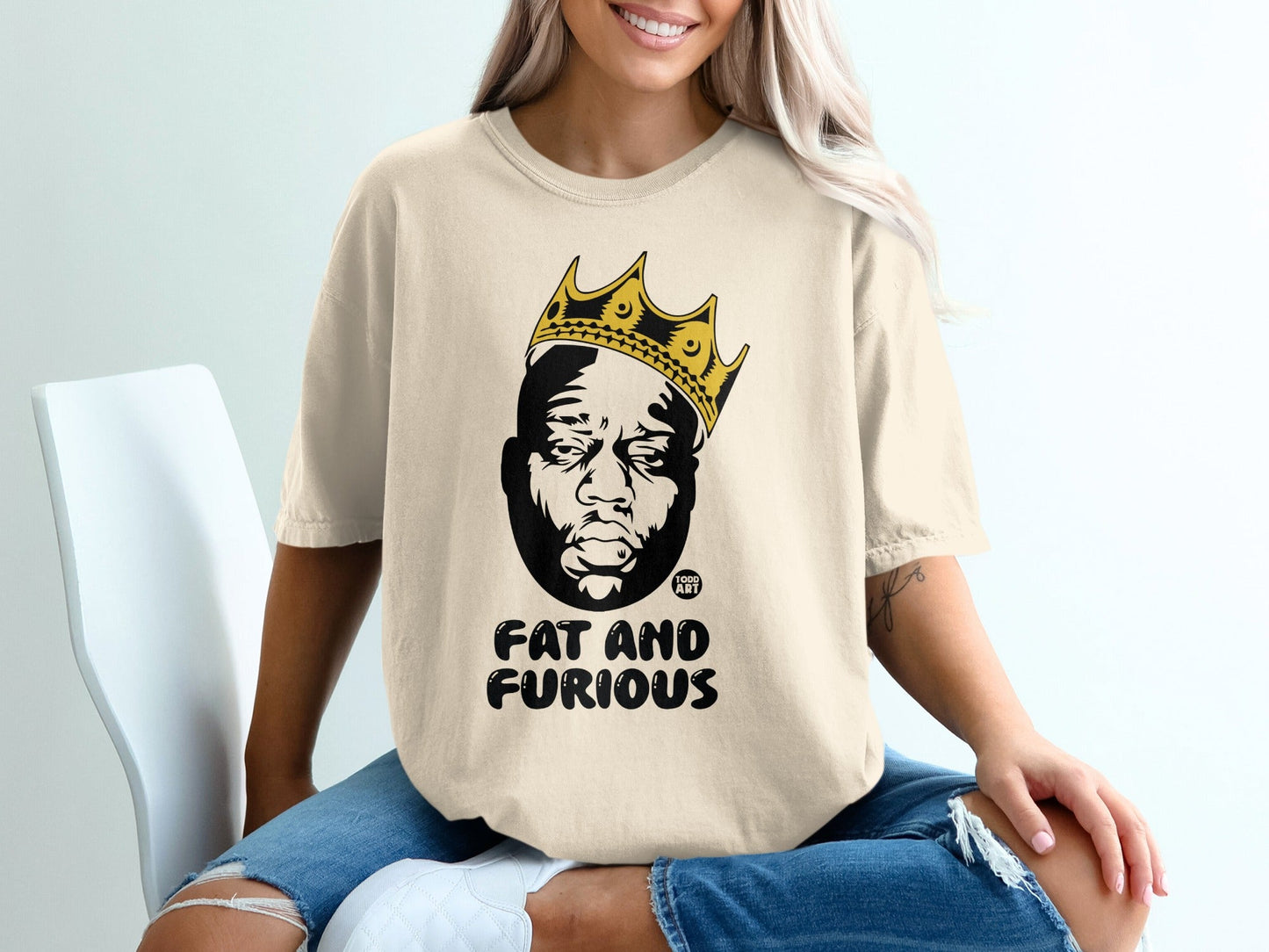 Cream t-shirt with Biggie Smalls graphic and "FAT AND FURIOUS" text.