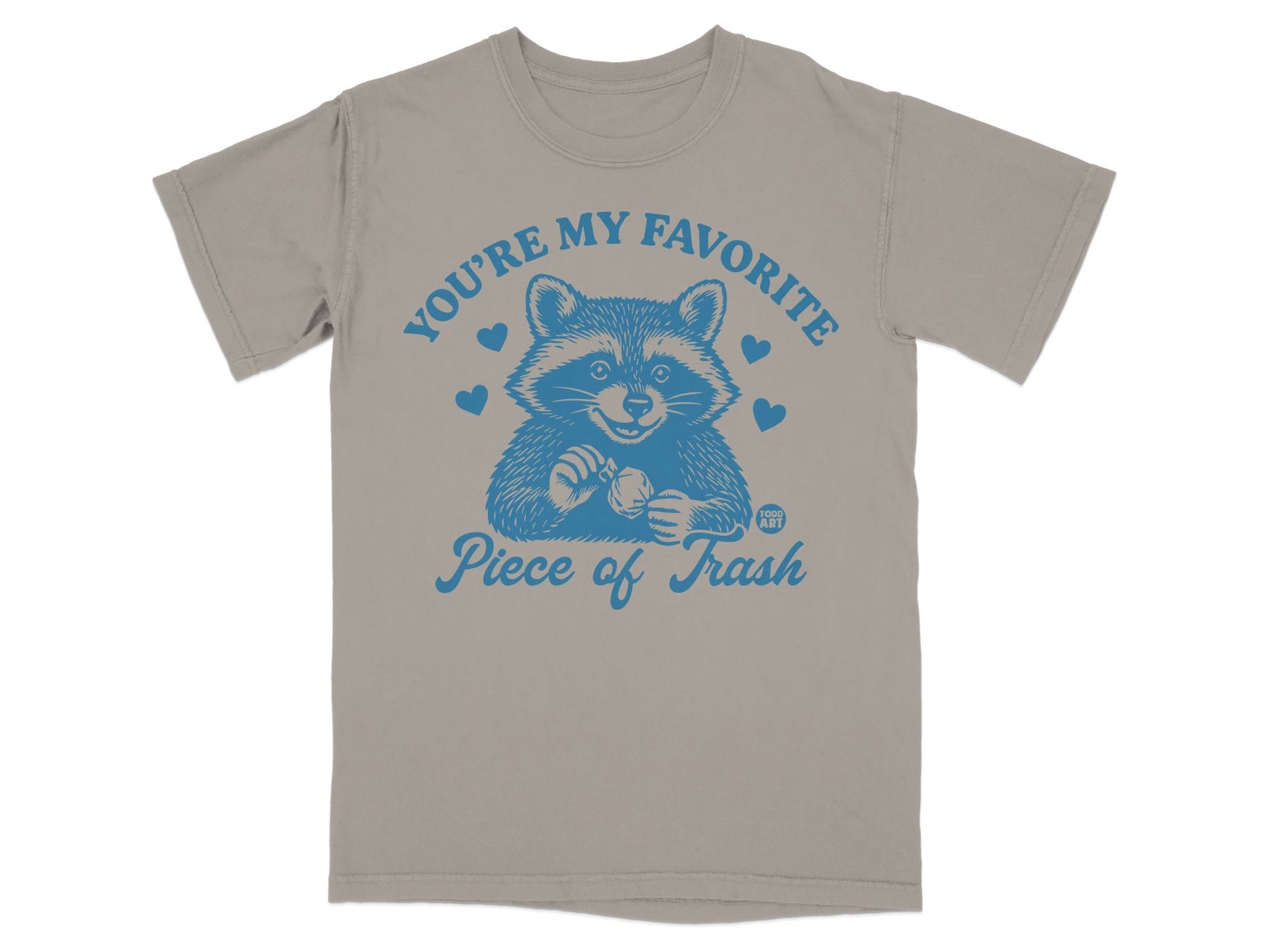 T-shirt with blue raccoon graphic and "You're my favorite piece of trash" text.
