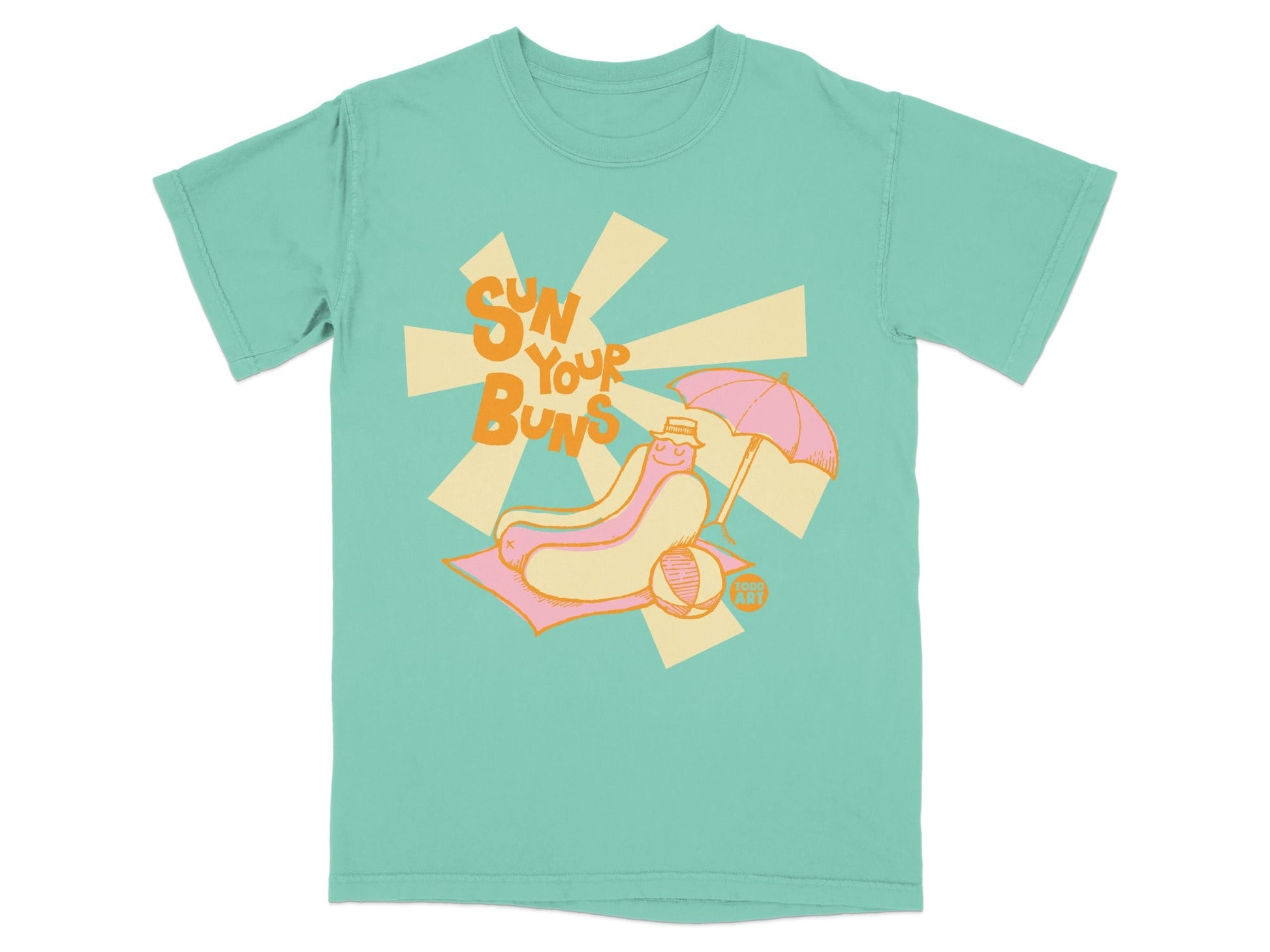 T-shirt graphic of a hot dog wearing a hat, sitting on a beach towel under an umbrella.