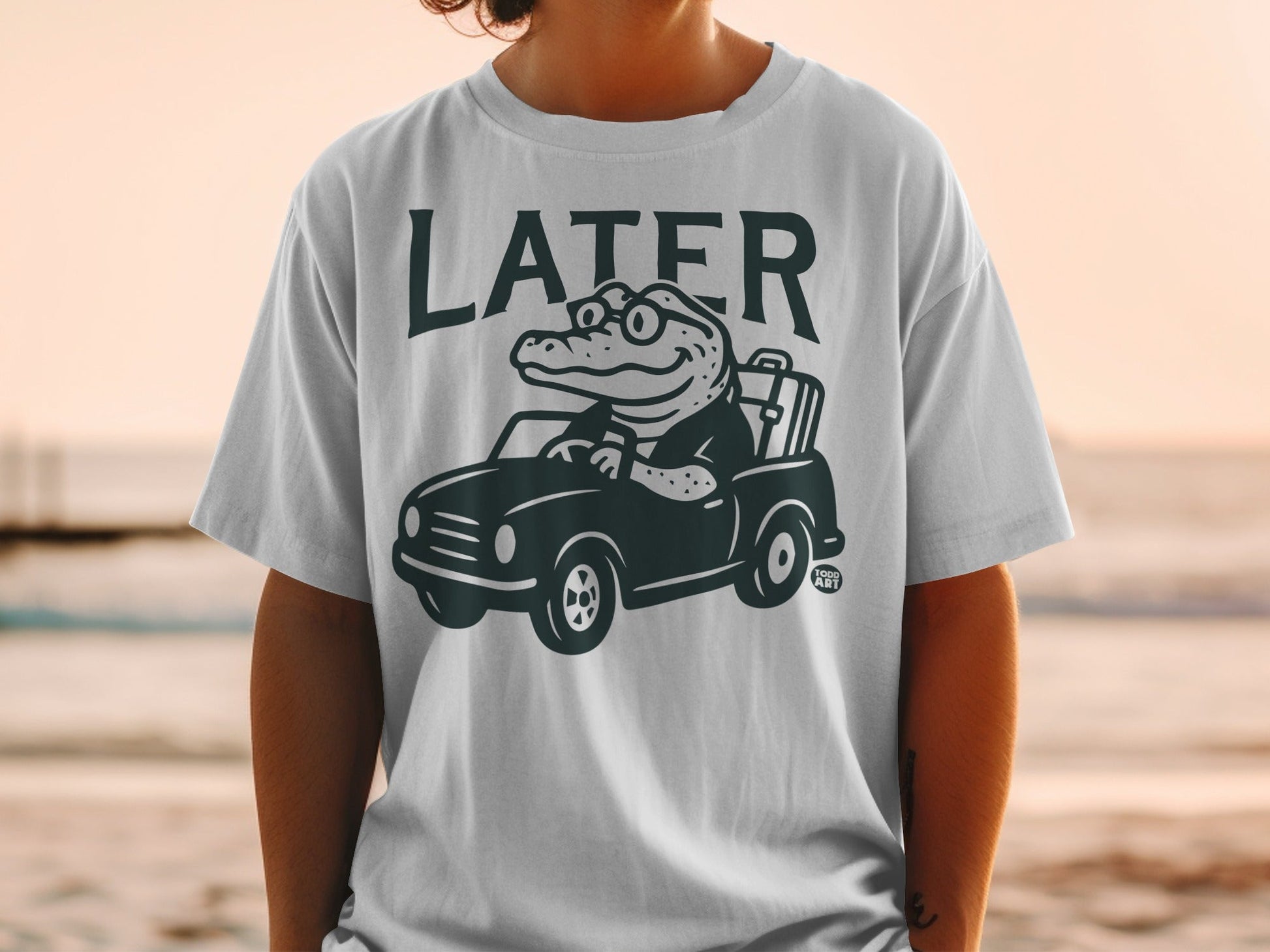 Cartoon alligator driving a car with luggage, "LATER" text above.