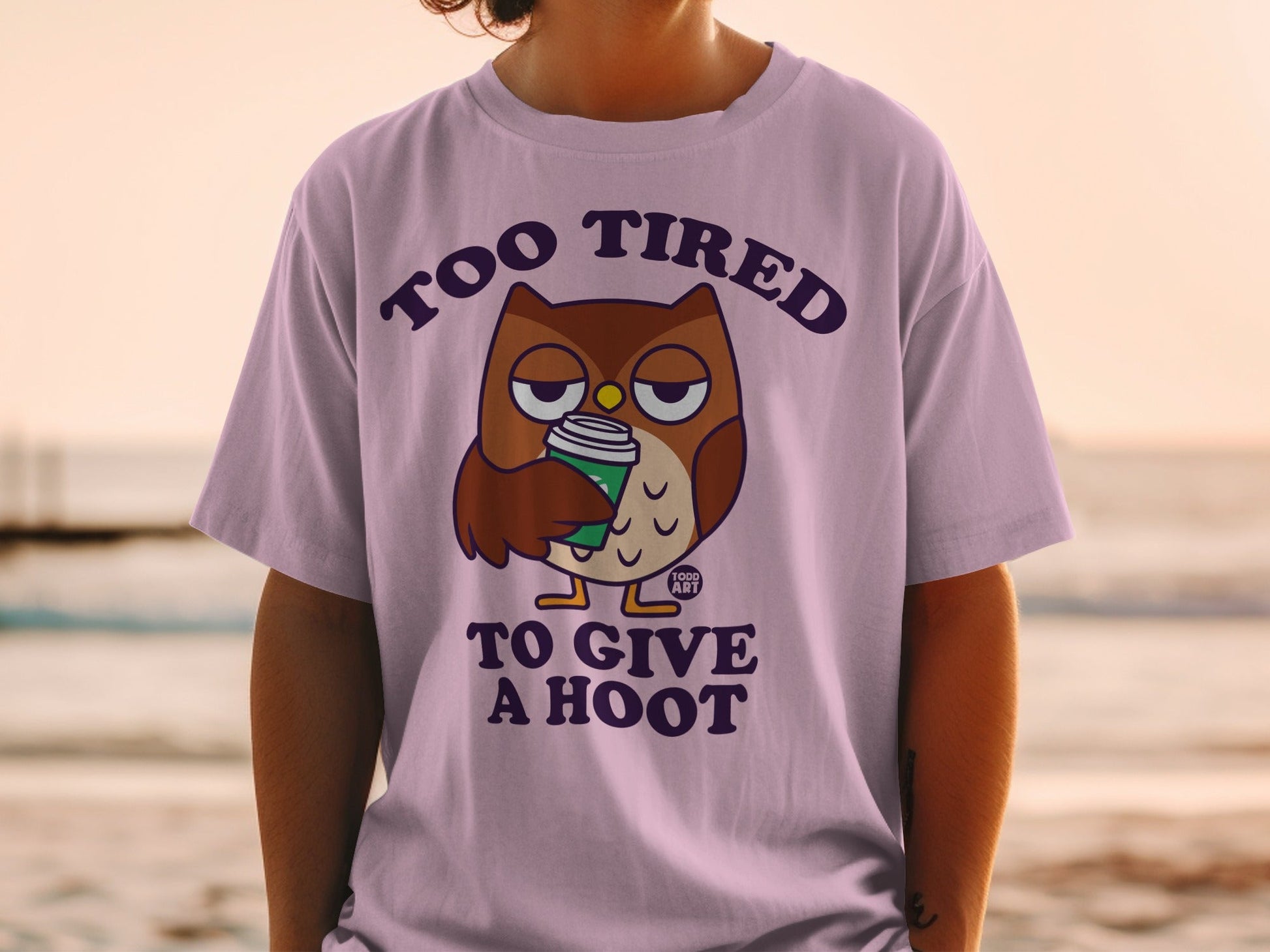 Tired owl holding coffee cup with text "TOO TIRED TO GIVE A HOOT".