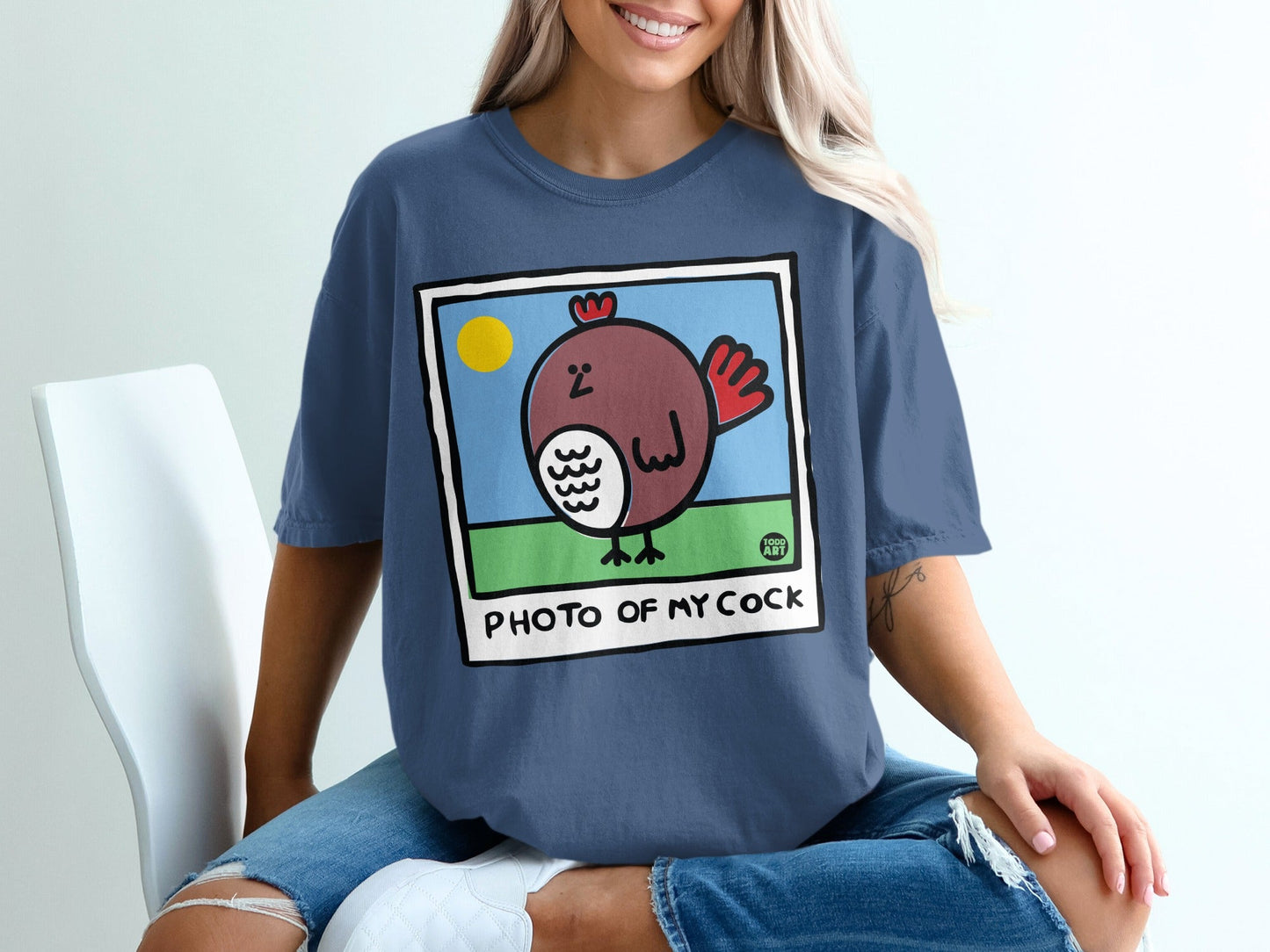 Blue t-shirt with a cartoon chicken and "PHOTO OF MY COCK" text.