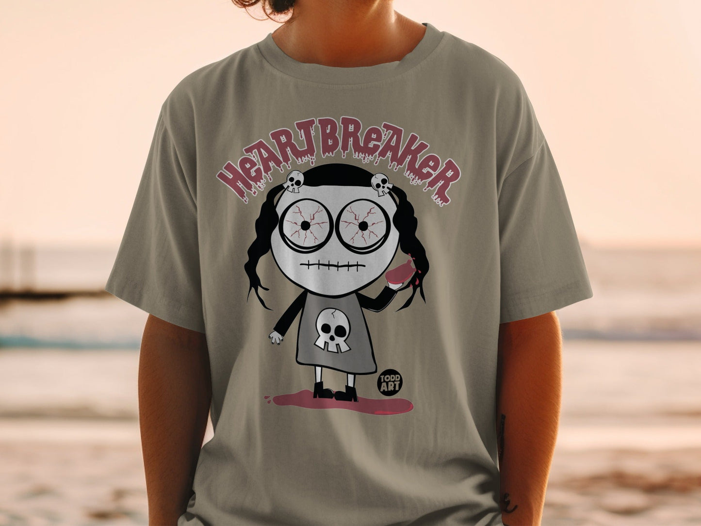Heartbreaker Graphic Tee with Unique Skull Design
