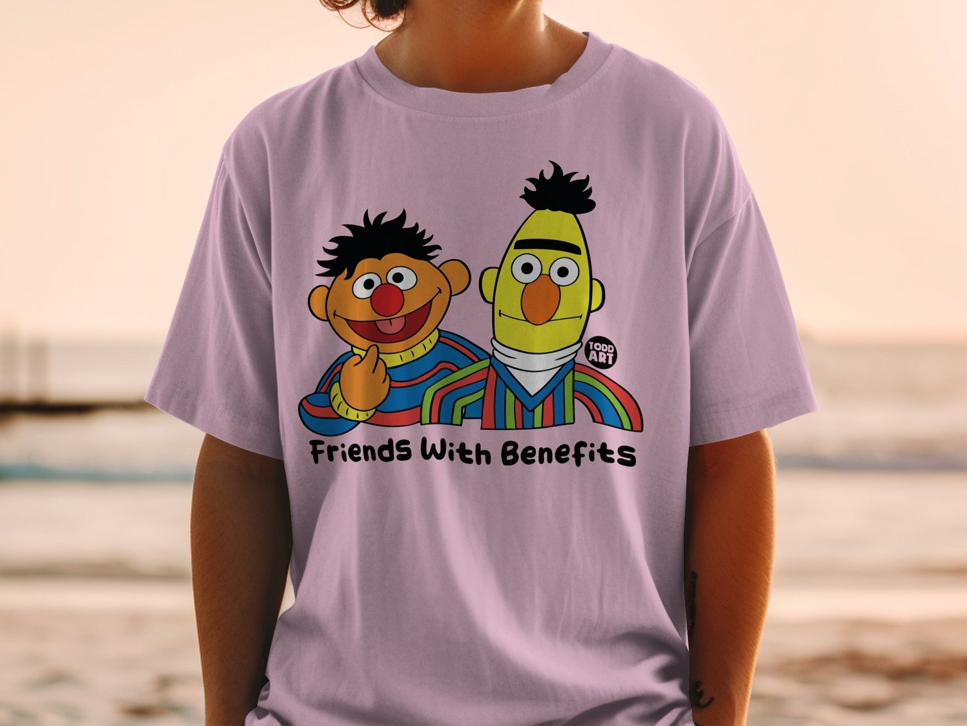 Bert and Ernie from Sesame Street on a purple t-shirt with "Friends With Benefits" text.