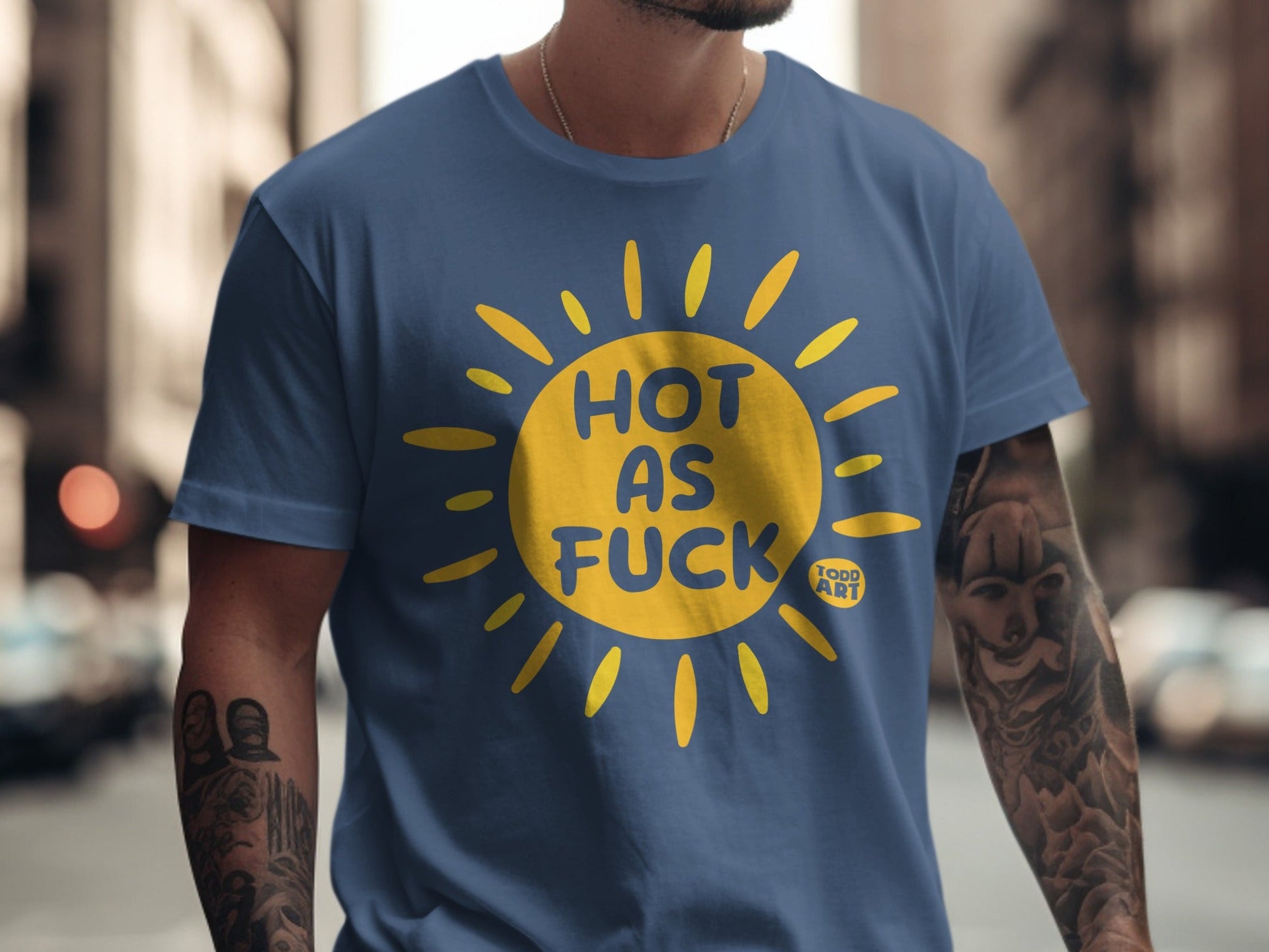 Navy t-shirt with yellow sun graphic and "HOT AS FUCK" text.