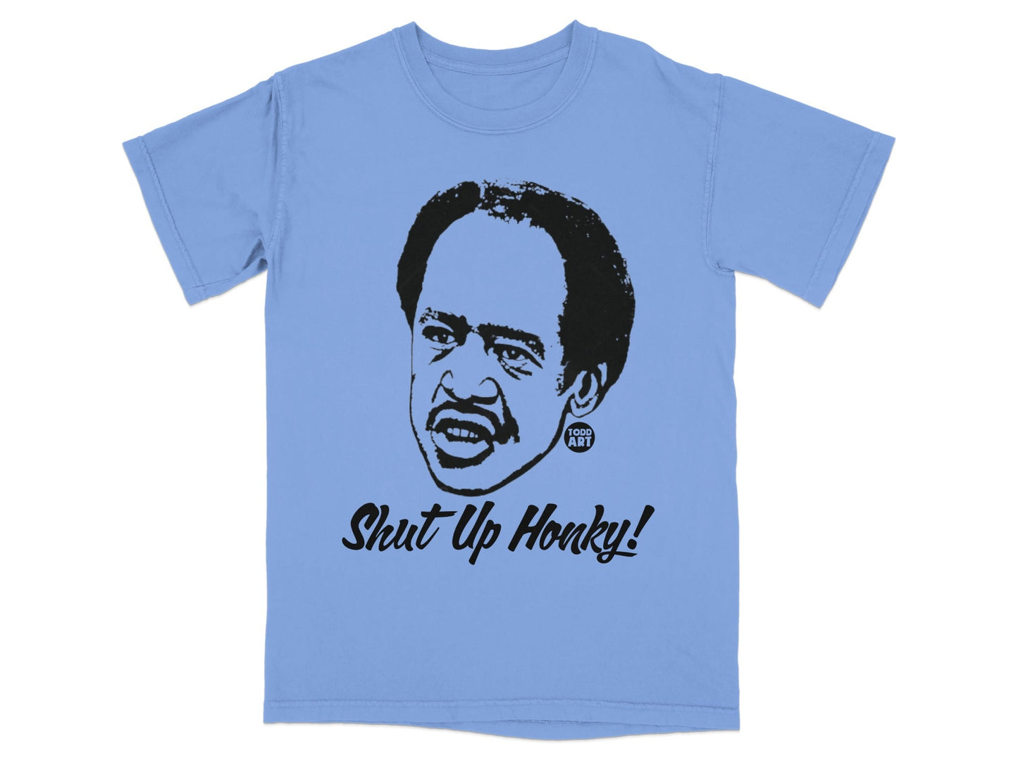 Light blue t-shirt featuring a graphic of Richard Pryor with the text "Shut Up Honky!".