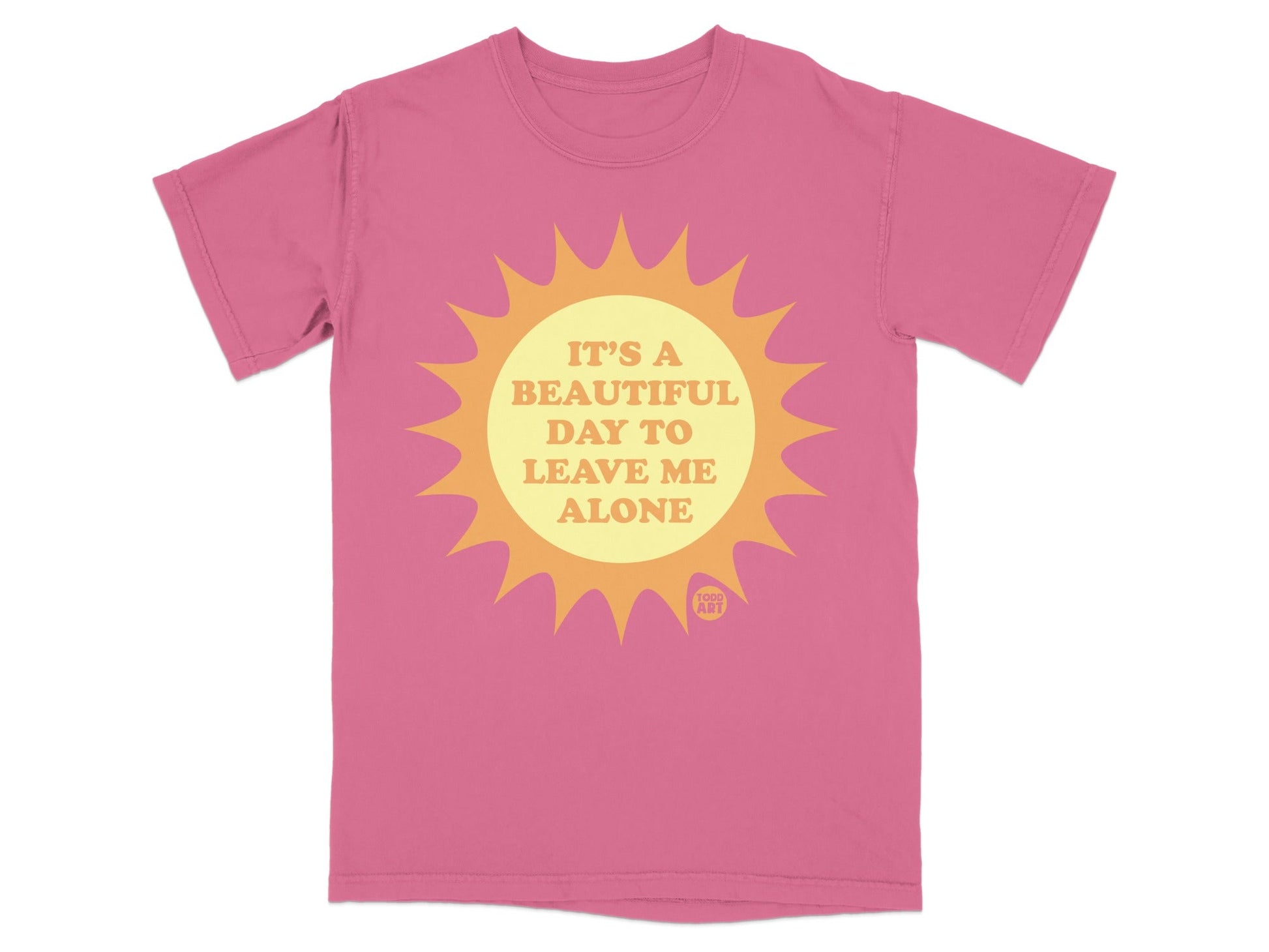 Pink t-shirt with sun graphic and text "IT'S A BEAUTIFUL DAY TO LEAVE ME ALONE".