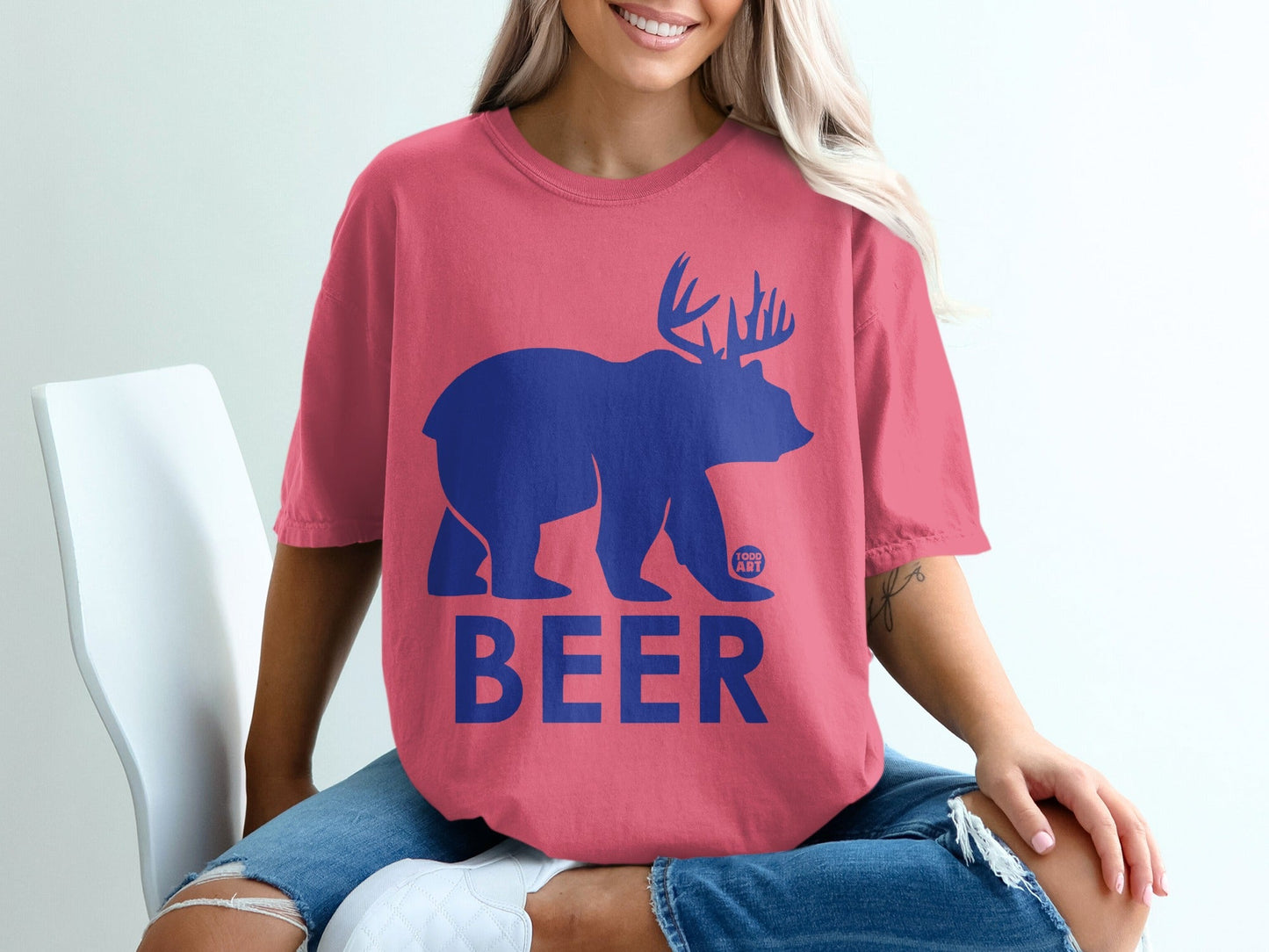 Pink Shirt with Blue Bear Beer Graphic Design