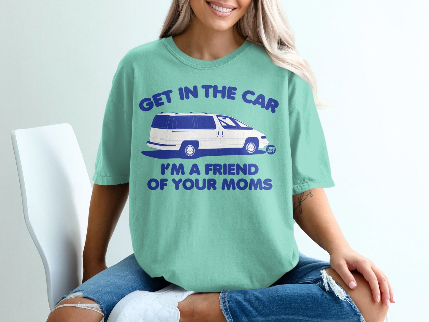 Teal t-shirt with "Get in the car I'm a friend of your moms" and a minivan graphic.