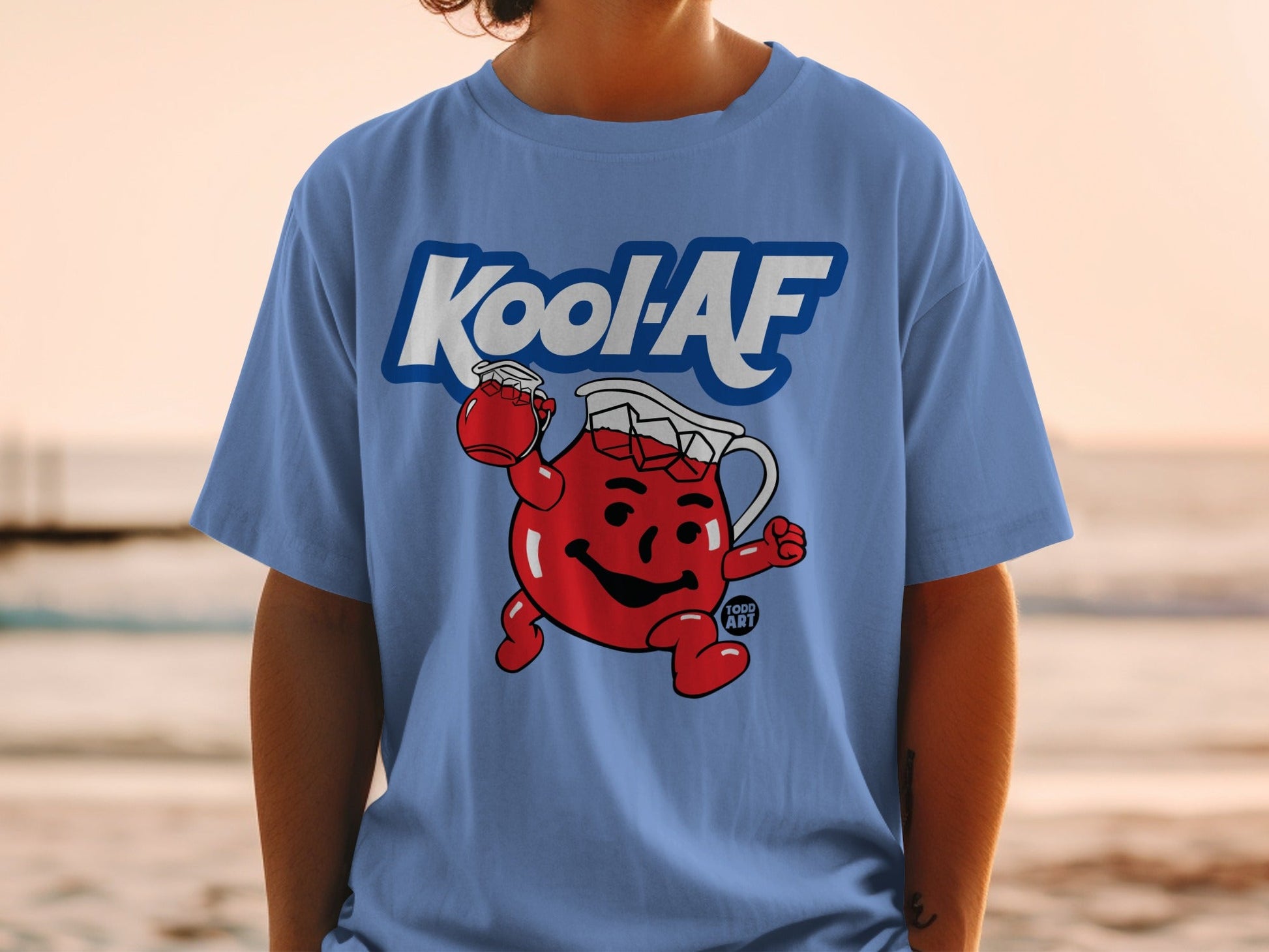 Kool-Aid Man character wearing a light blue t-shirt with "Kool-AF" logo.