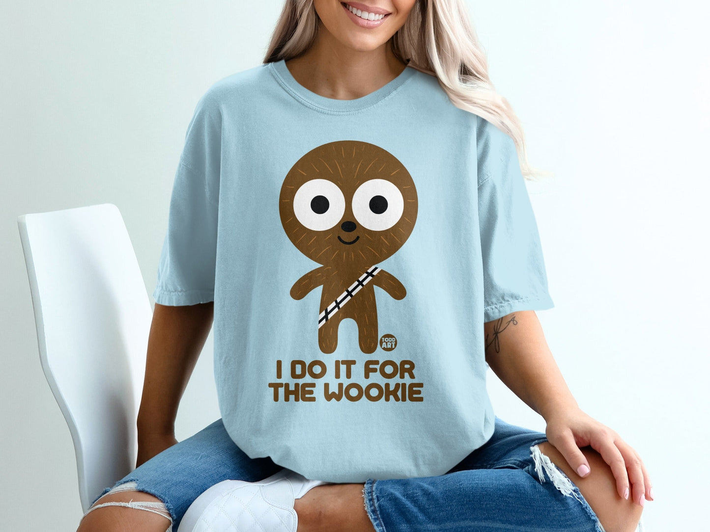 Light blue t-shirt with cartoon Wookie and text "I DO IT FOR THE WOOKIE".