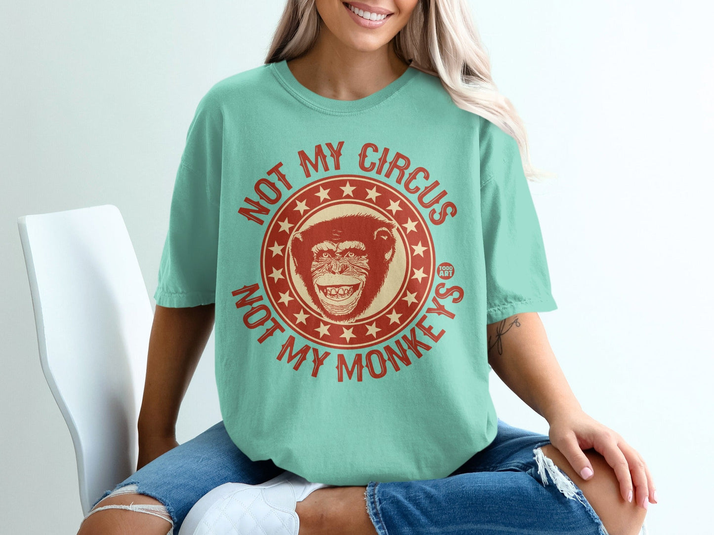T-shirt with "NOT MY CIRCUS NOT MY MONKEYS" text and monkey graphic.