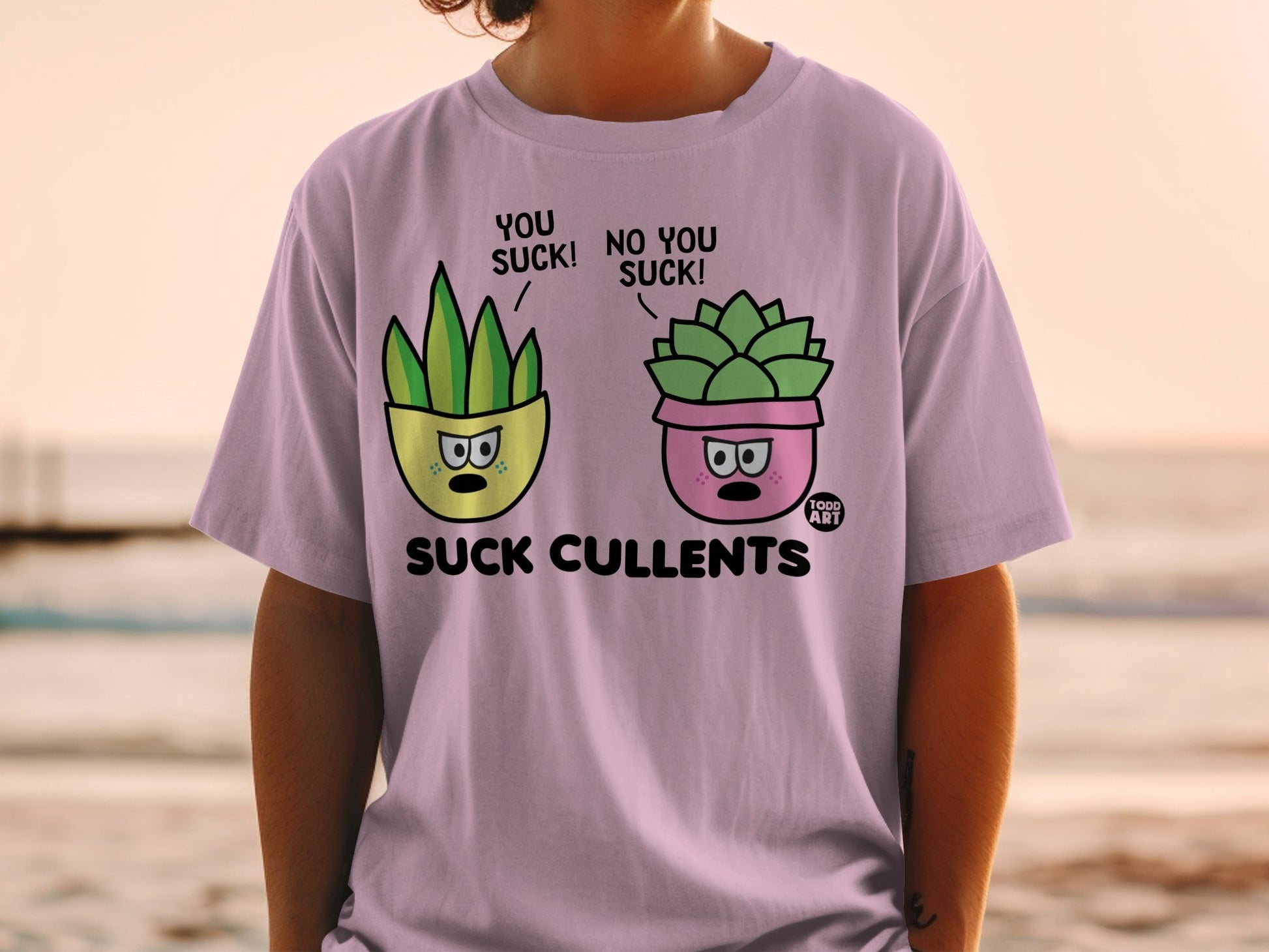 T-shirt with "Suck Cullents" graphic, featuring cartoon succulents in pots.