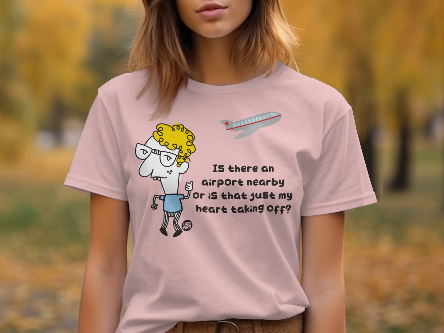 Funny Cartoon T-Shirt With Quirky Saying Is There An Airport