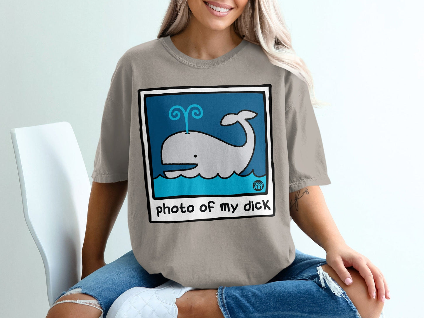 Cartoon whale spouting water above blue waves, text "photo of my dick".