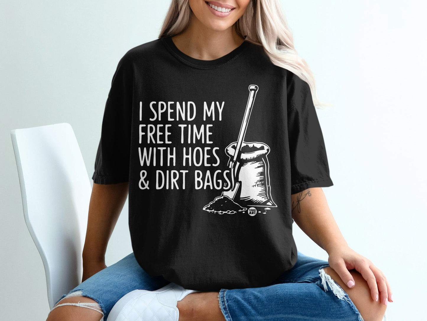 Black t-shirt with "I SPEND MY FREE TIME WITH HOES & DIRT BAGS" and shovel graphic.