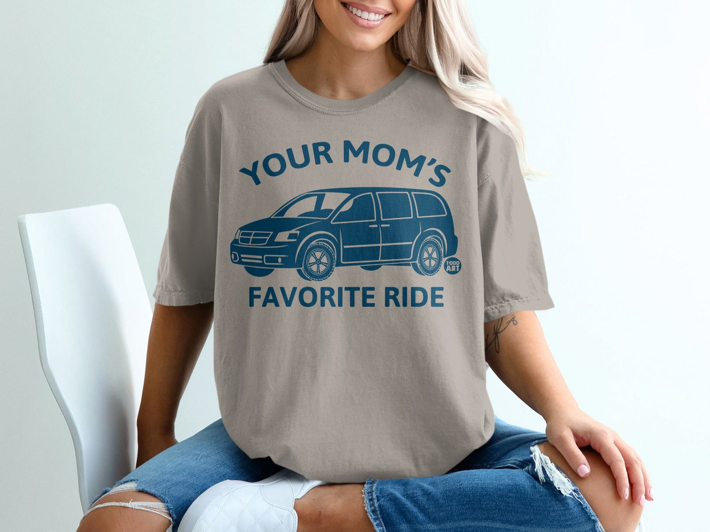 T-shirt with "YOUR MOM'S FAVORITE RIDE" and a minivan graphic.