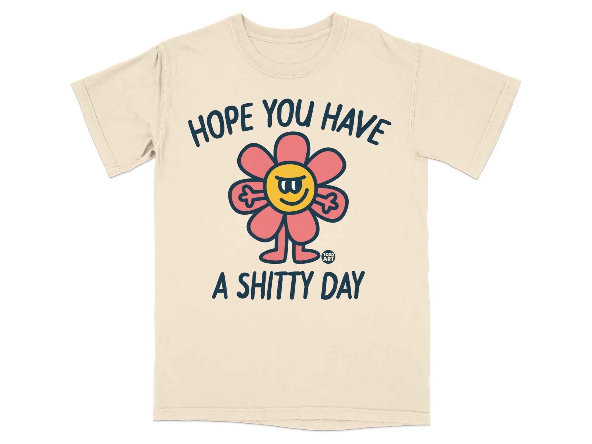 Cream t-shirt with a cartoon flower and text "HOPE YOU HAVE A SHITTY DAY".