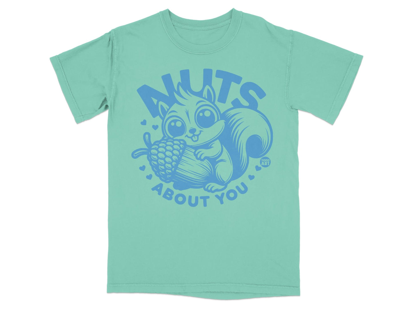 Teal t-shirt with a cartoon squirrel holding an acorn and the text "Nuts About You".