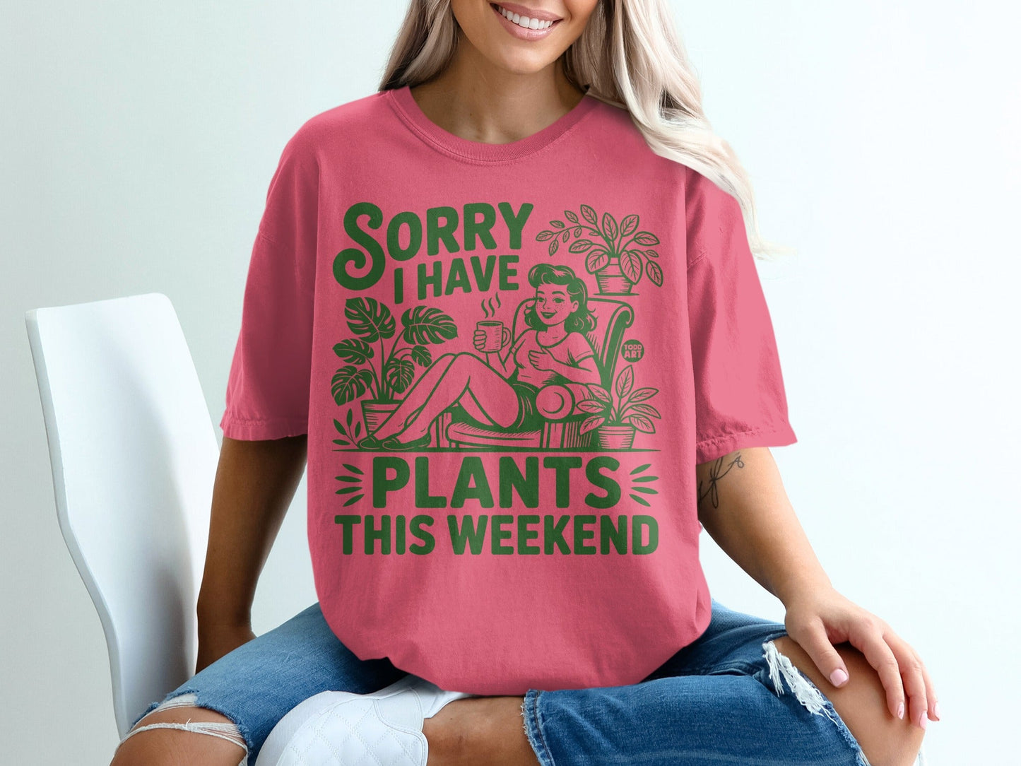 Pink t-shirt with green text "SORRY I HAVE PLANTS THIS WEEKEND".