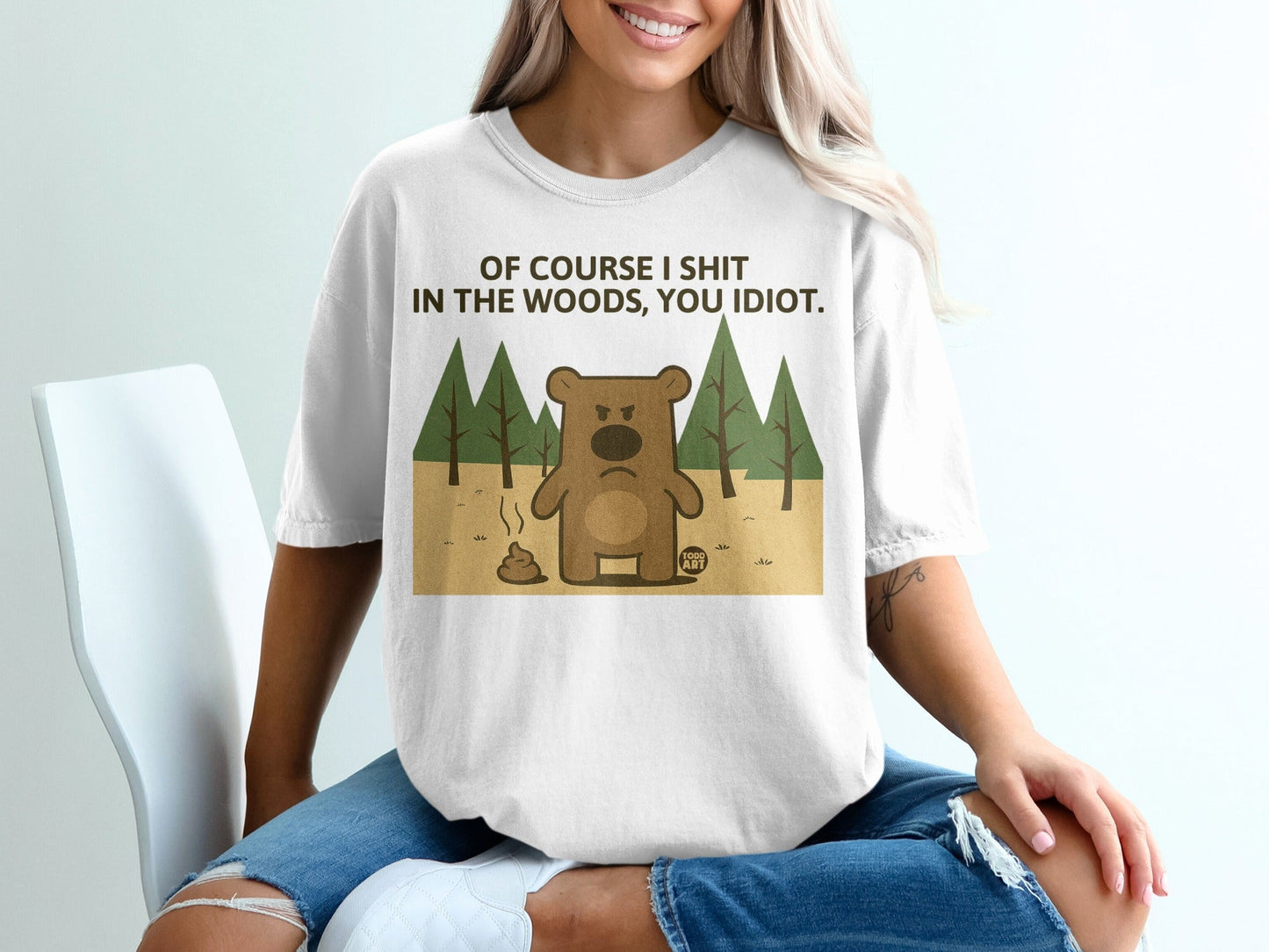 Bear graphic on white t-shirt with "Of course I shit in the woods, you idiot."