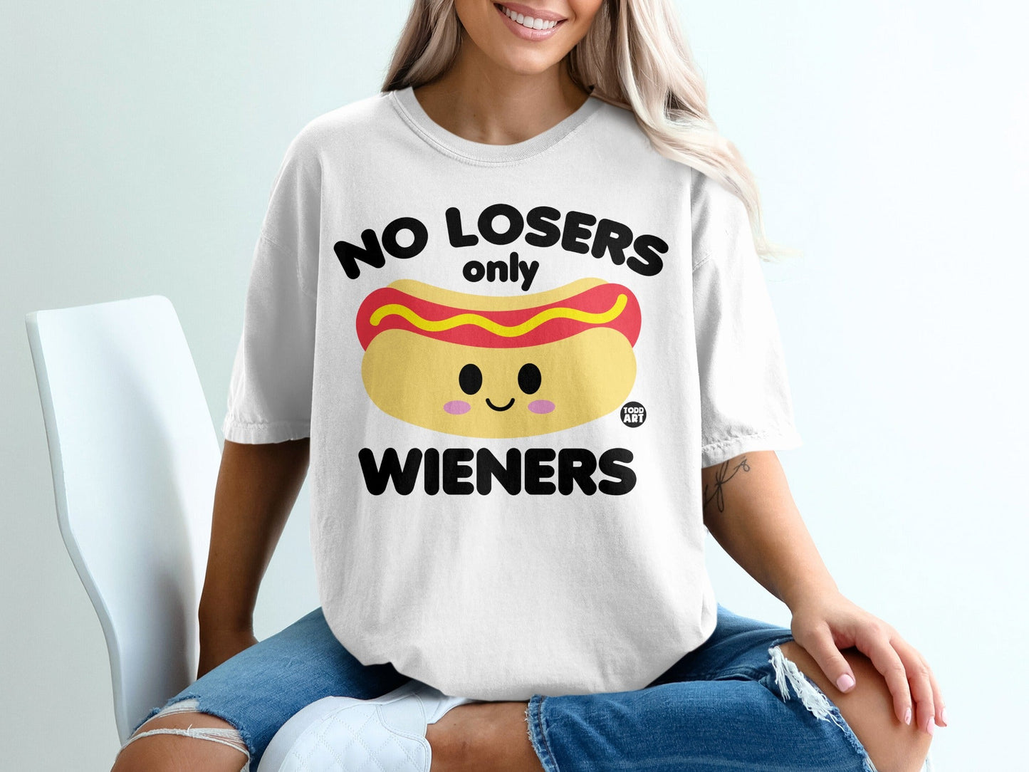 White t-shirt with "NO LOSERS only WIENERS" and a cartoon hot dog graphic.