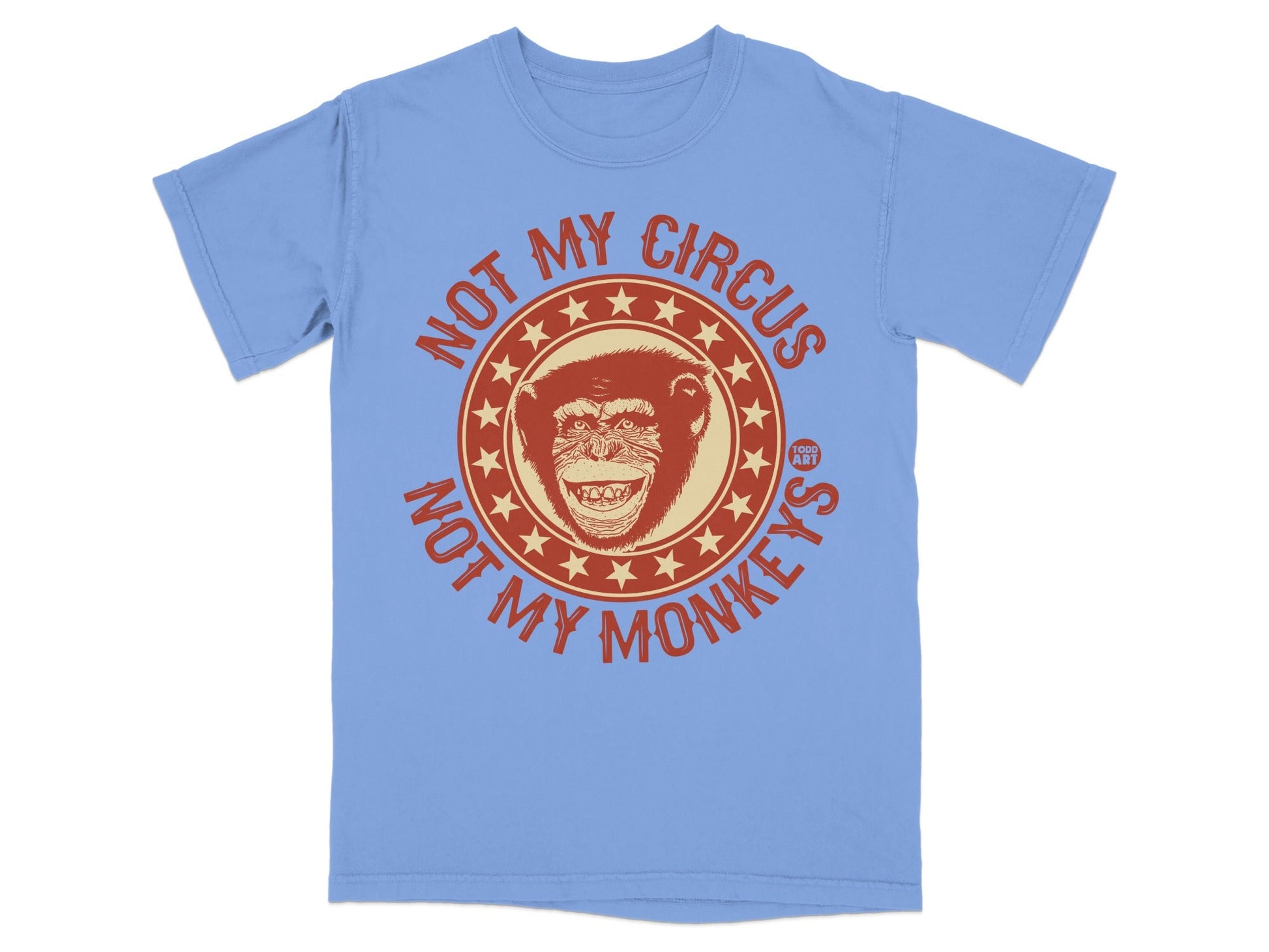 Light blue t-shirt with a distressed circle graphic featuring a monkey and "NOT MY CIRCUS NOT MY MONKEYS" text.