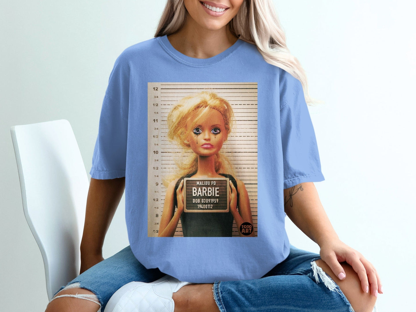 Barbie mugshot with "Malibu PD Barbie" text, DOB 03091959.