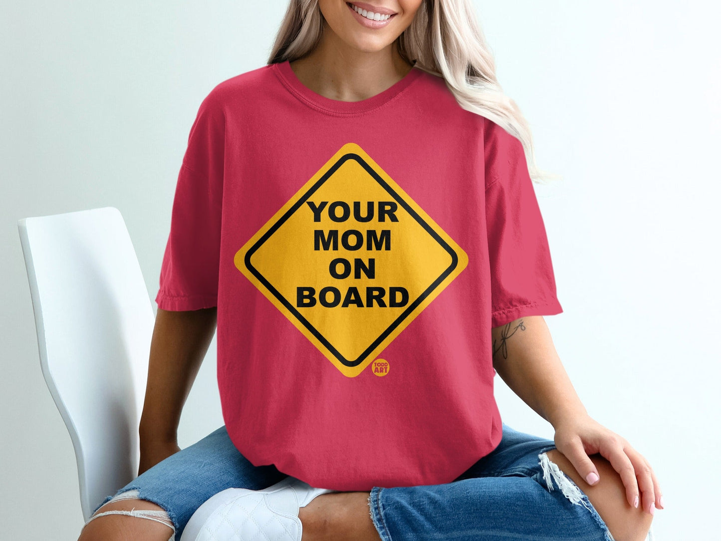 Red t-shirt with yellow diamond sign saying "Your Mom On Board".