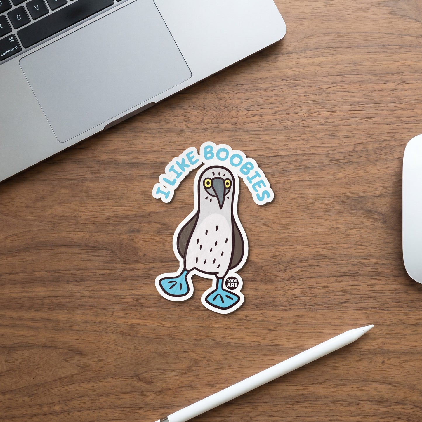 Sticker of a cartoon booby bird with "I like boobies" text and "Todd Art" logo.