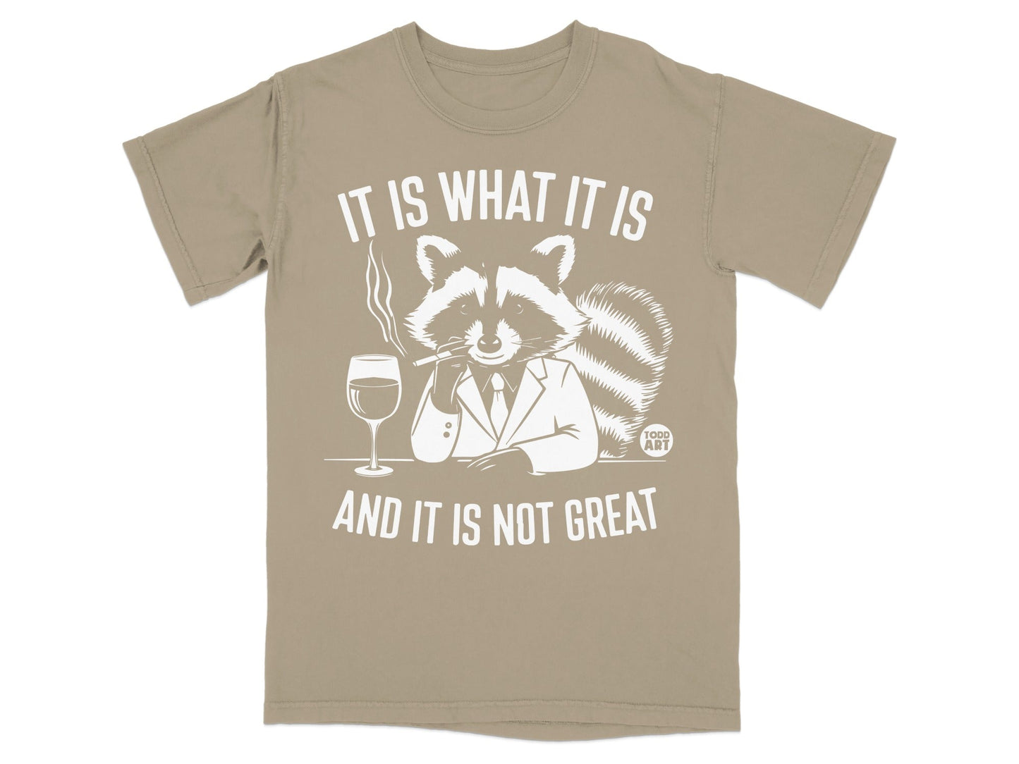 T-shirt with a raccoon in a suit smoking and drinking, with text "IT IS WHAT IT IS AND IT IS NOT GREAT".