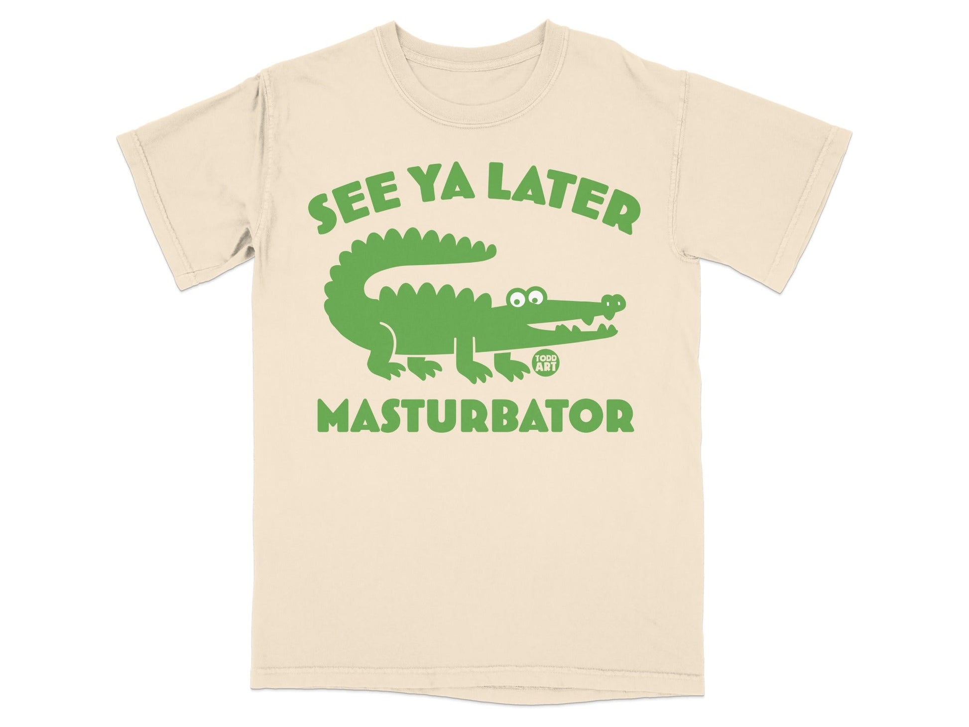 Green alligator graphic with text "SEE YA LATER MASTURBATOR" on a cream t-shirt.