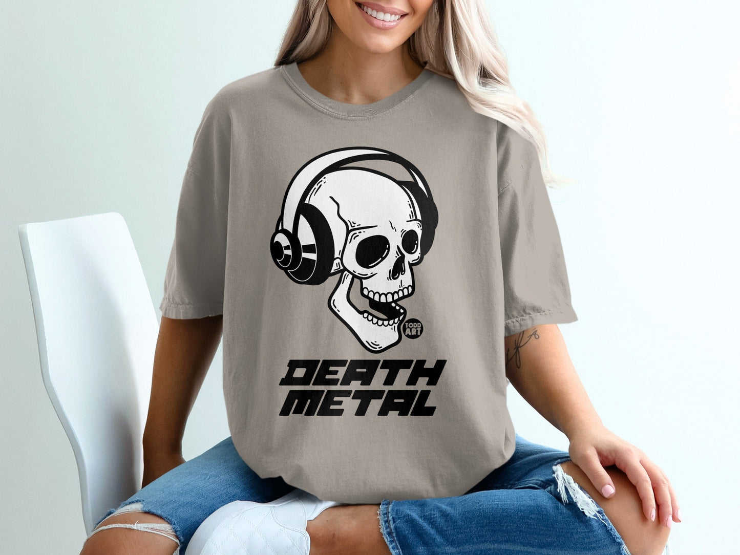 Skull wearing headphones with "DEATH METAL" text.