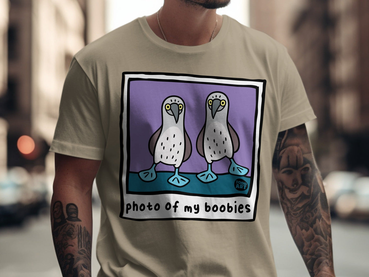 T-shirt graphic of two blue-footed boobies with "TODD ART" and "photo of my boobies".