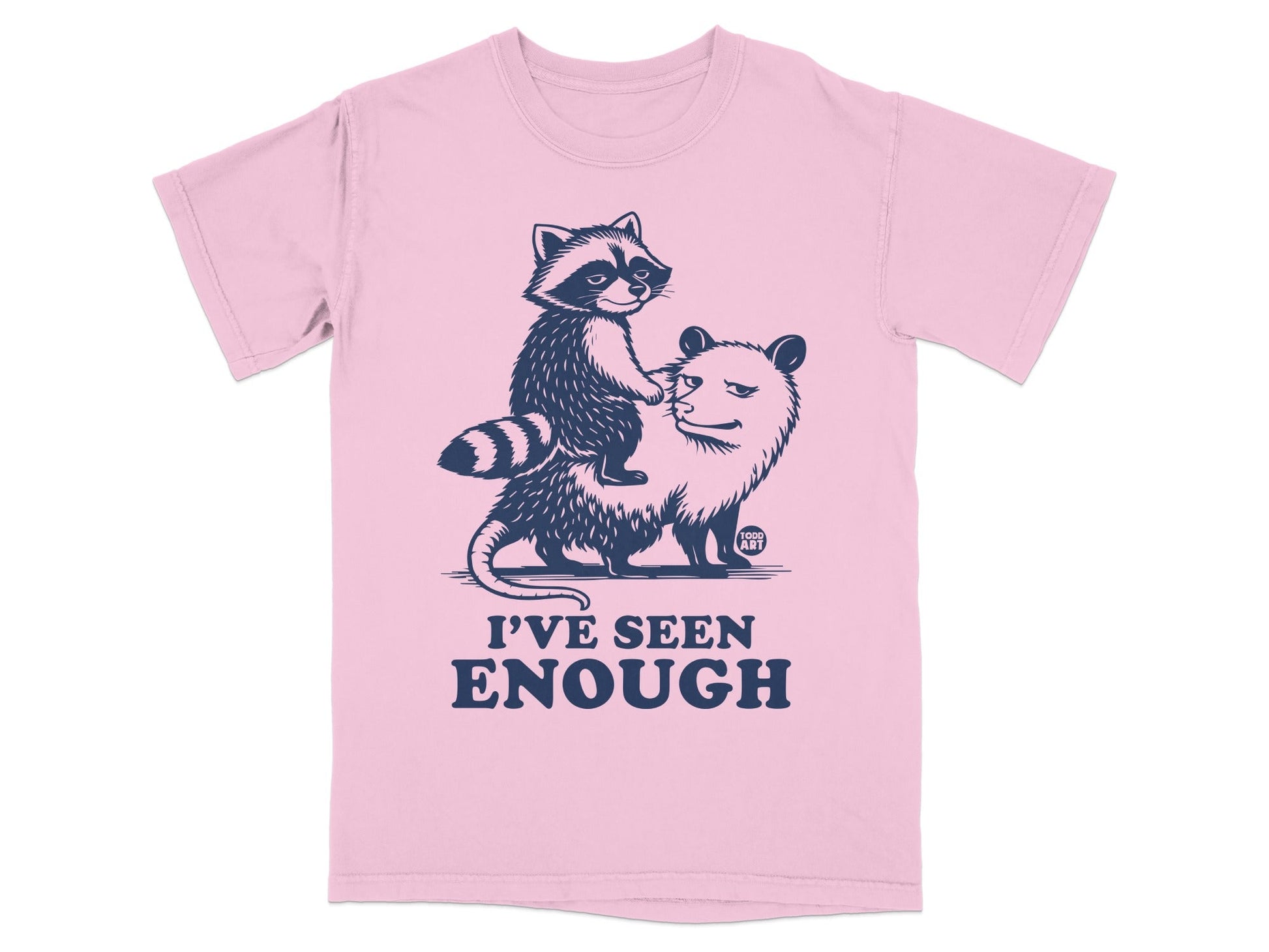Pink t-shirt with a raccoon riding an opossum, "I'VE SEEN ENOUGH" text.