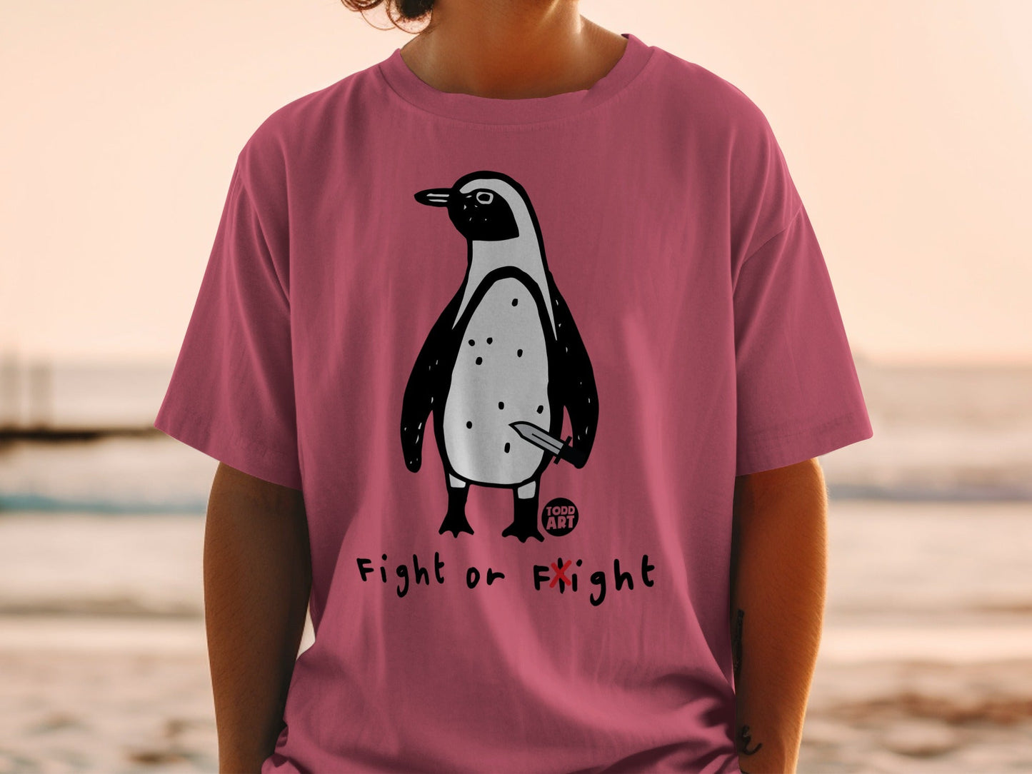 Pink t-shirt with a penguin holding a knife, "Fight or Flight" text.