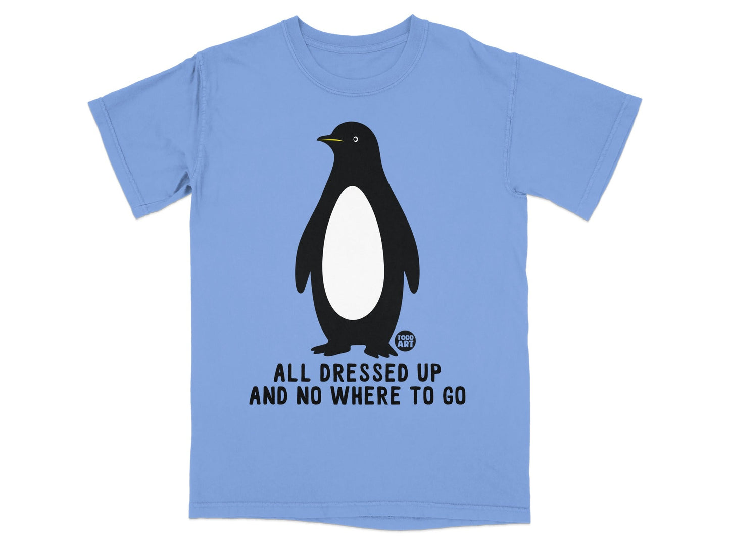Light blue t-shirt with a black and white penguin and "ALL DRESSED UP AND NO WHERE TO GO" text.