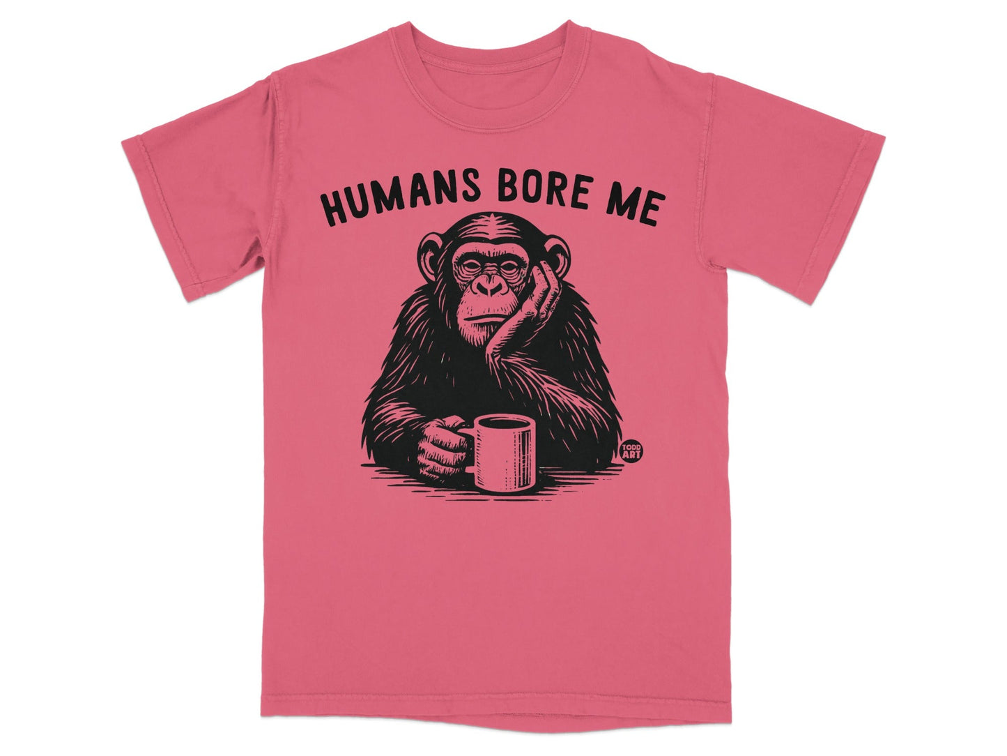 Chimpanzee holding mug, text reads "Humans Bore Me".