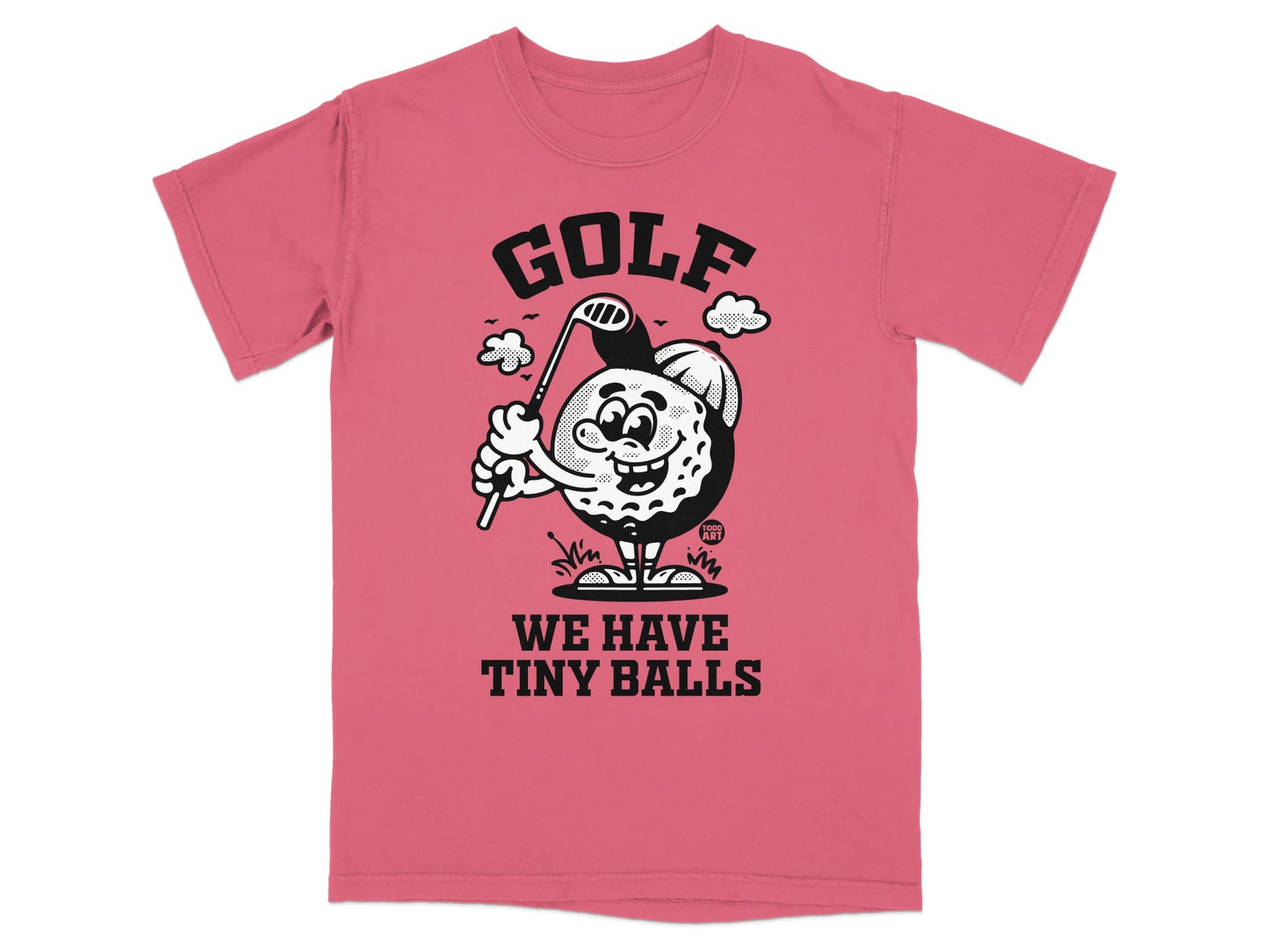 T-shirt with cartoon golf ball swinging club and "GOLF WE HAVE TINY BALLS" text.
