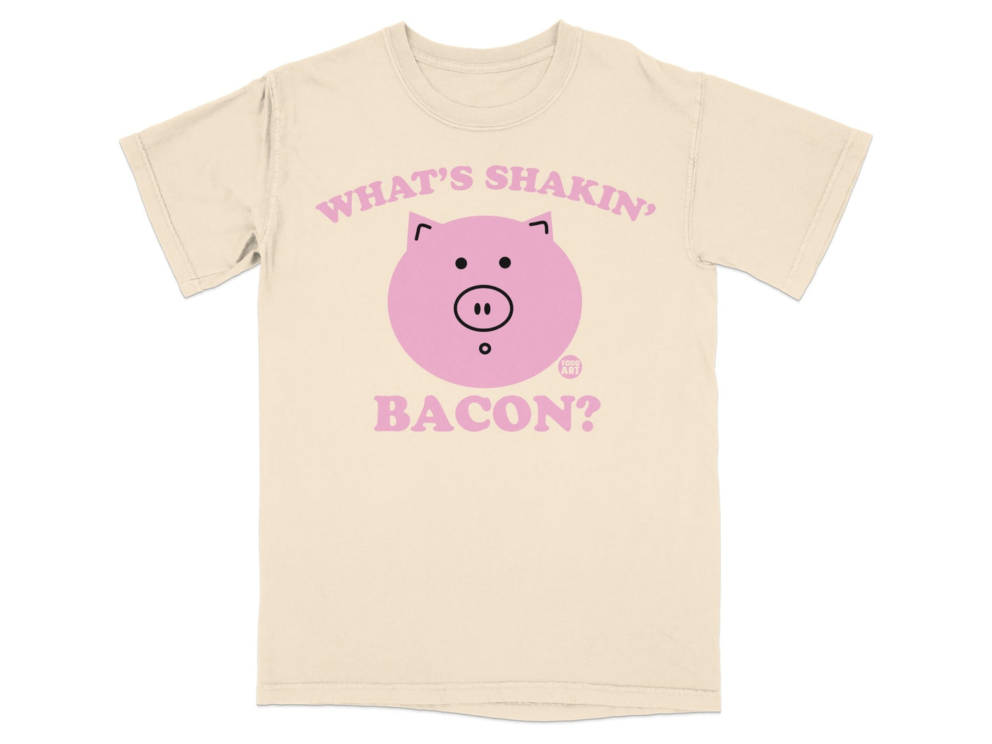 Cream t-shirt with "What's shakin' bacon?" text and pig graphic.