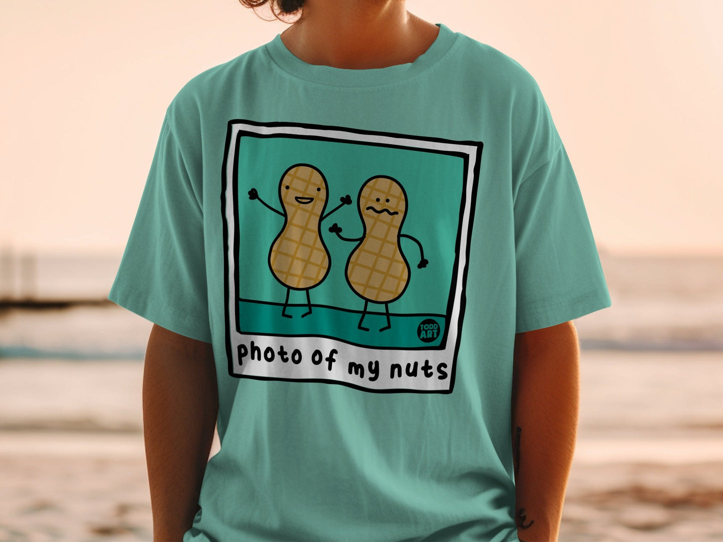 Peanut characters in a polaroid frame with "photo of my nuts" text.