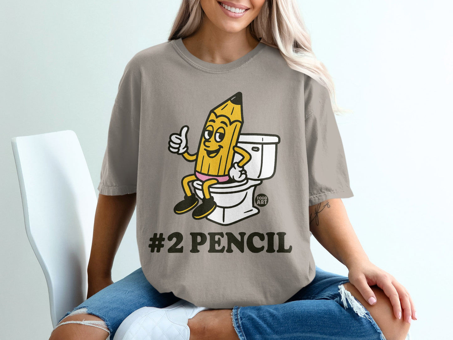 Cartoon #2 pencil giving a thumbs up from a toilet bowl.